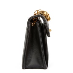 1991 Chanel Black Vertical Quilted Lambskin Vintage Mini Flap Bag