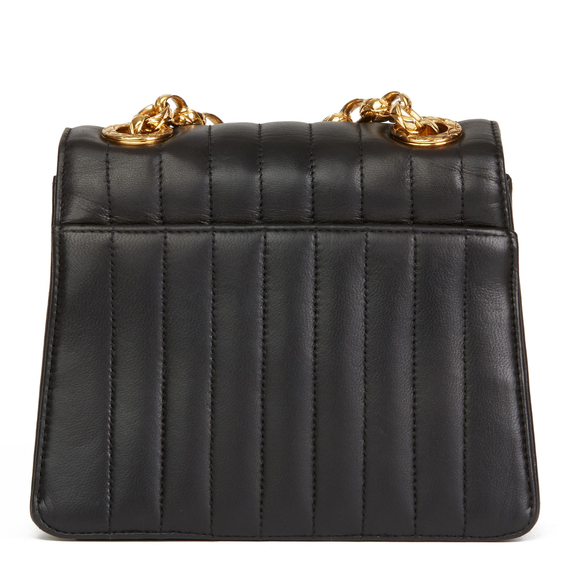 Women's 1991 Chanel Black Vertical Quilted Lambskin Vintage Mini Flap Bag