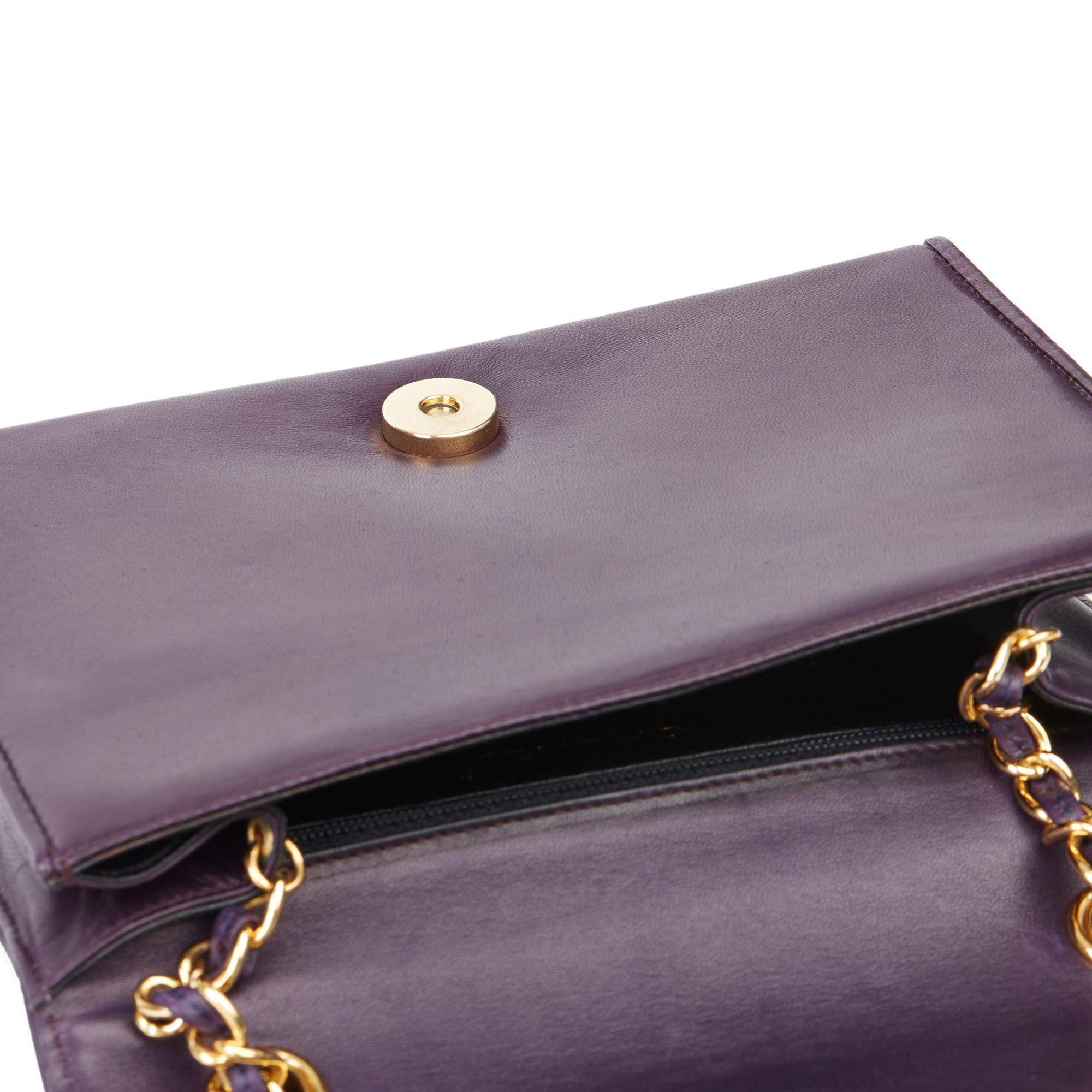 CHANEL 
Purple Lambskin Vintage Timeless Single Flap Bag

Xupes Reference: HB3504
Serial Number: 1050617
Age (Circa): 1991
Accompanied By: Authenticity Card
Authenticity Details: Authenticity Card, Serial Sticker (Made in Italy)
Gender: Ladies
Type: