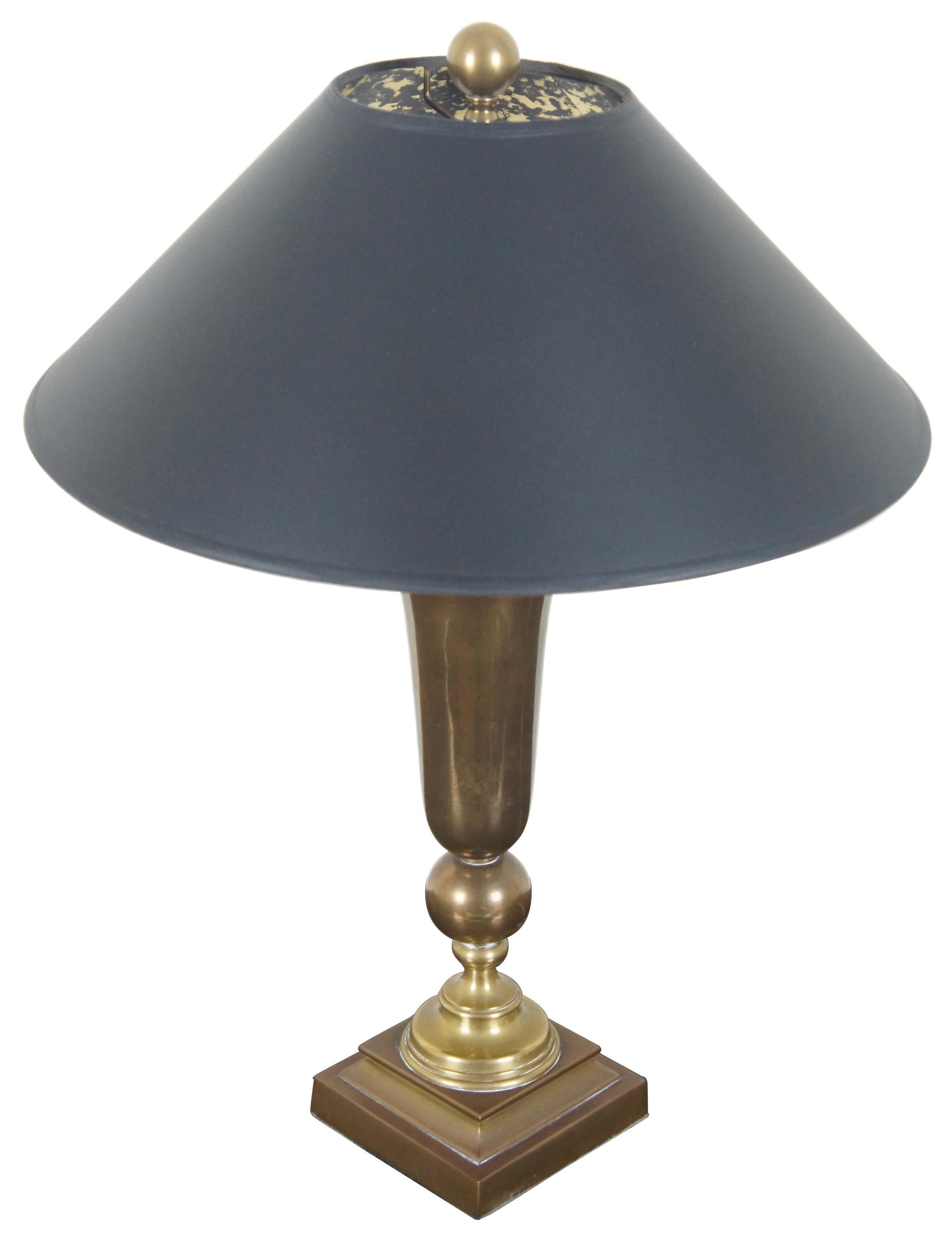 Vintage 1991 Chapman graceful urn form lamp 15100A. Features an urn / trumpet or trophy shape with black shade and gold foil interior.

Measures: Shade 16” x 6” (Diameter x Height), 23”.