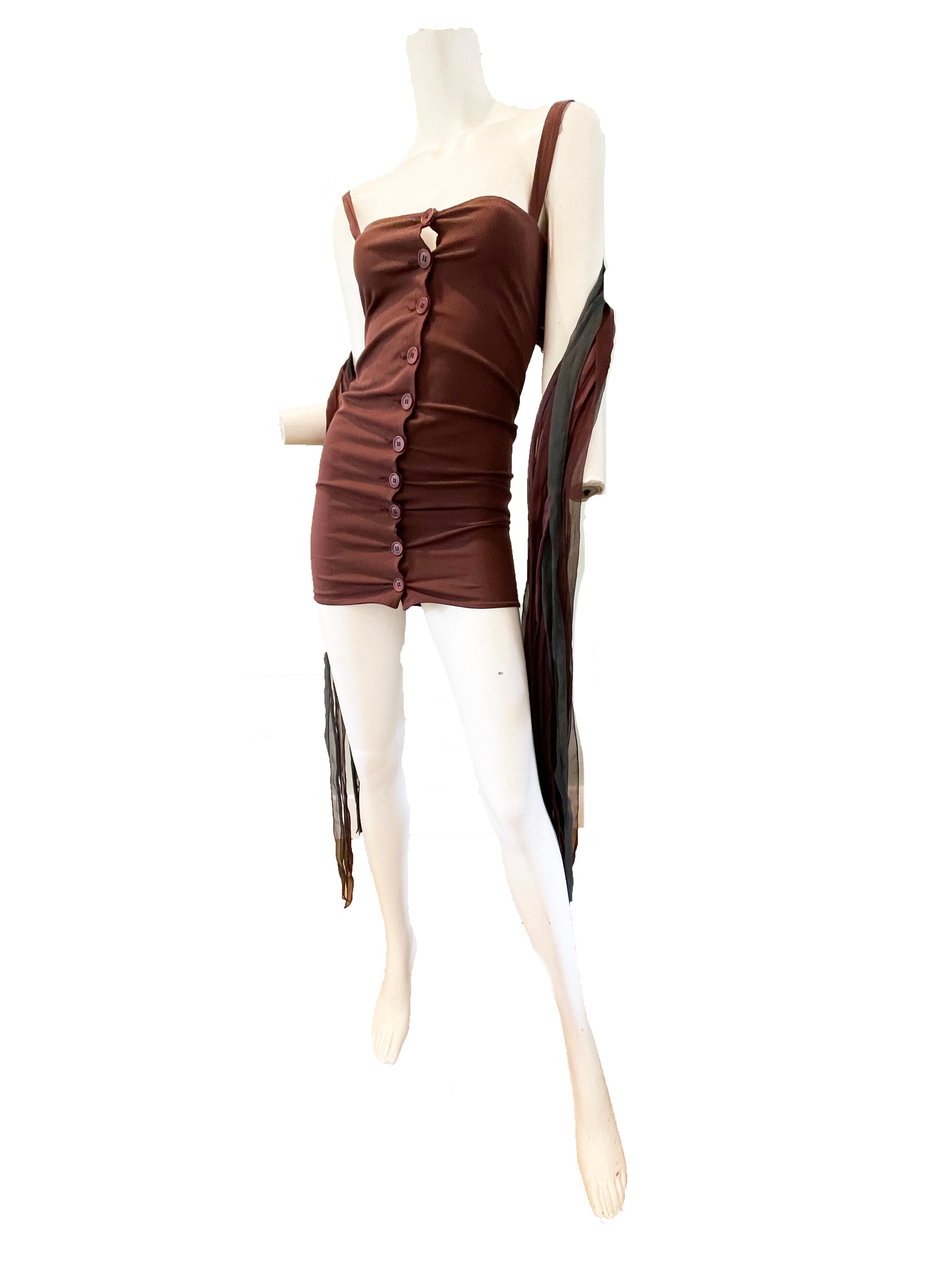 1991 Dolce & Gabbana Mini-Stretch-Kleid mit langen Seidensträngen auf dem Rücken.

Knöpfe auf der Vorderseite

Zustand: Ausgezeichnet

Größe XS/ Klein 

