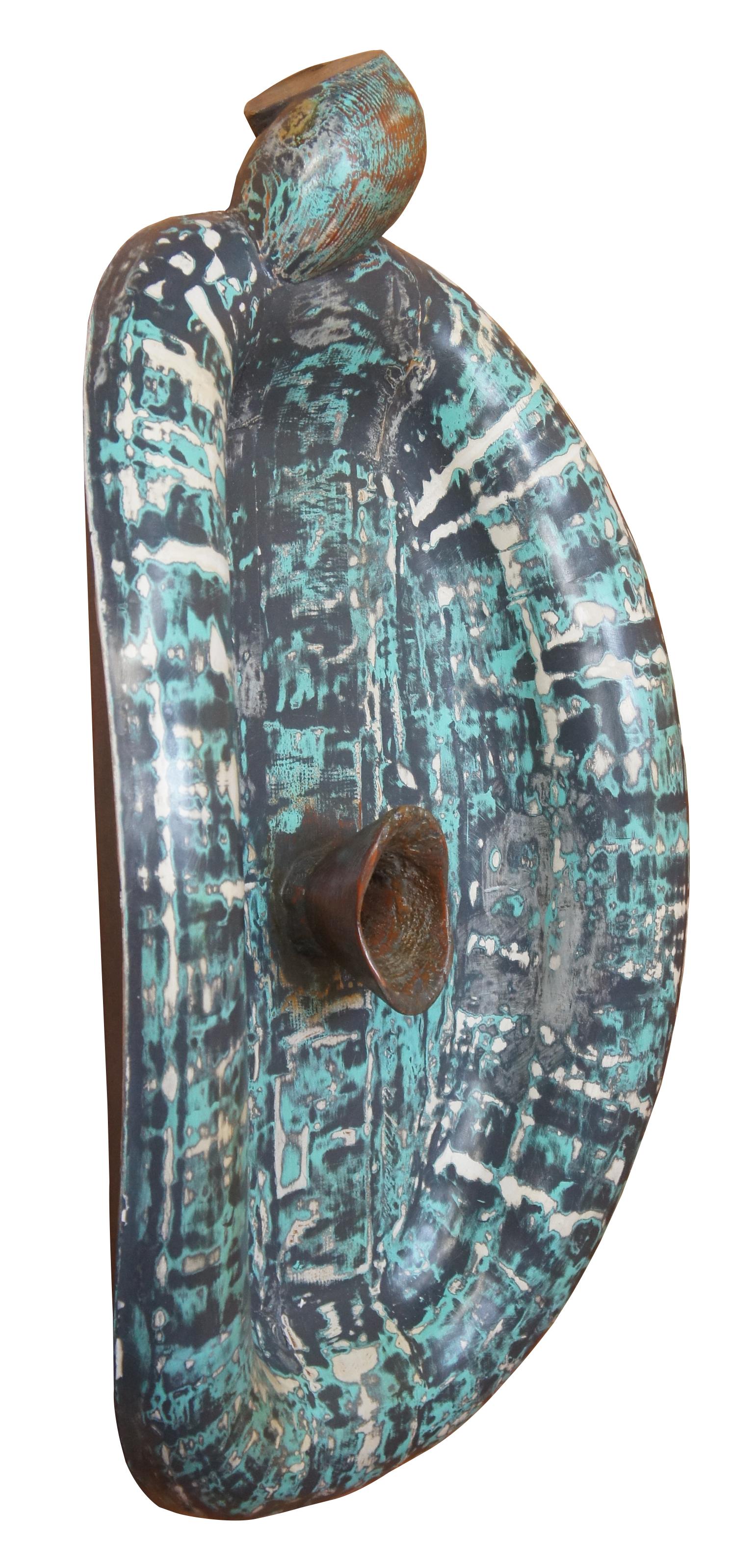 1991 Jack Carter hand carved and painted abstract modern wall art sculpture.

Wall medallion sculpture, features modern styling with tortoise shell shape and hand carved detail / painted finish.