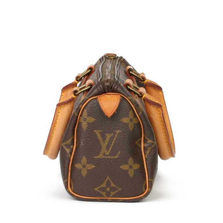 1991 Louis Vuitton Brown Monogram Coated Canvas and Leather