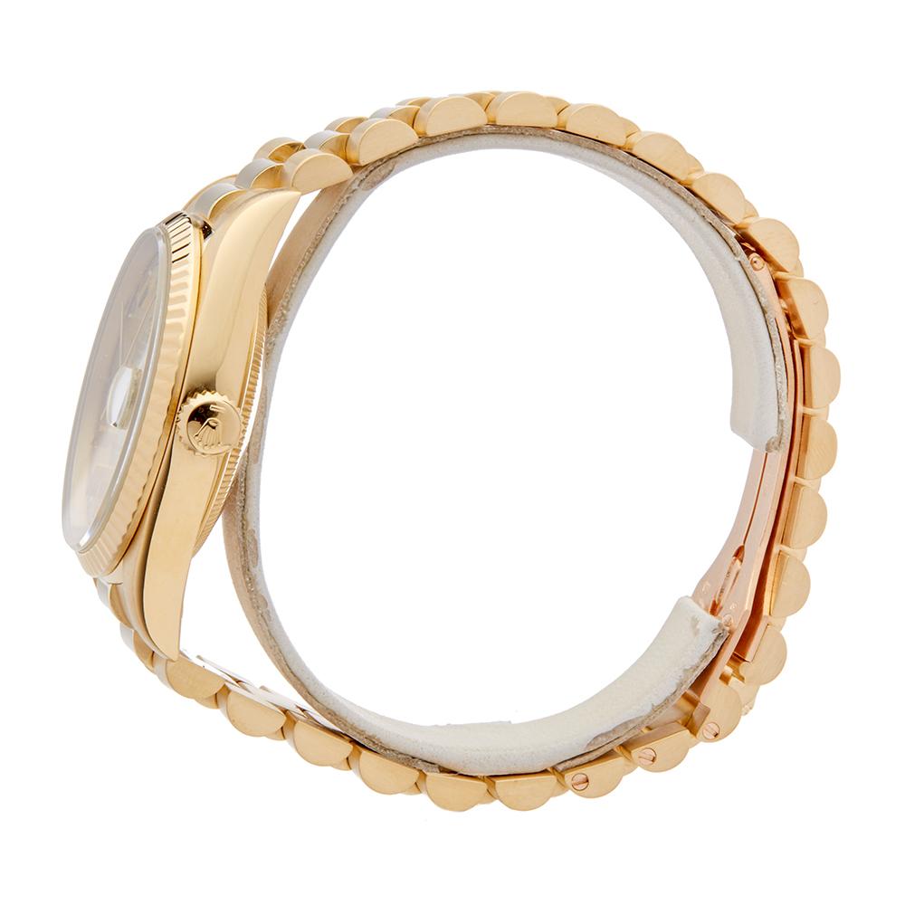 Contemporary 1991 Rolex Day-Date Yellow Gold 18038 Wristwatch
 *
 *Complete with: Presentation Pouch dated 1991
 *Case Size: 36mm
 *Strap: 18K Yellow Gold President
 *Age: 1991
 *Strap length: Adjustable up to 17cm. Please note we can order spare