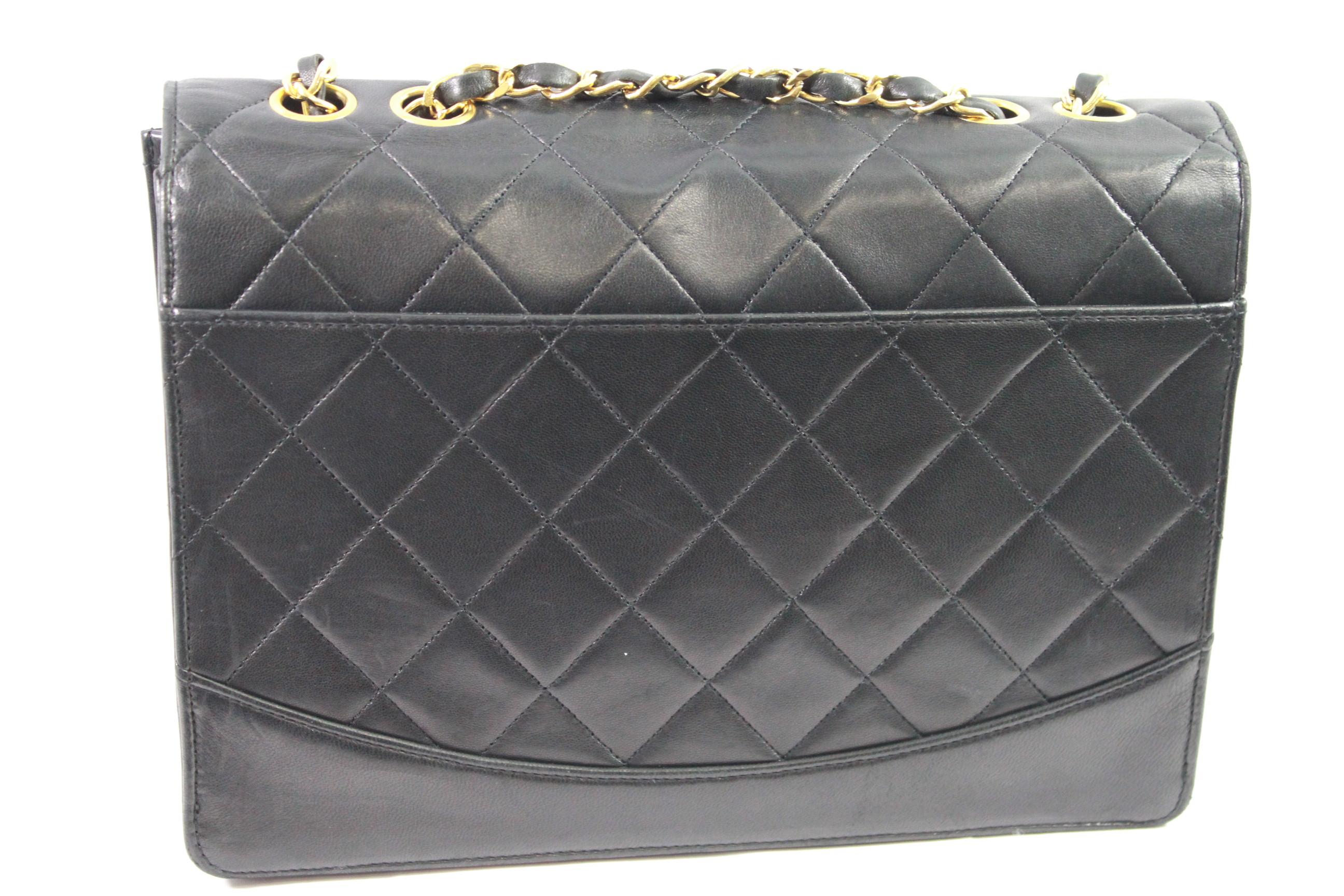 Women's or Men's 1991 Vintage Chanel Black Lambskin Leather Bag with 2.55 Golden Hardware