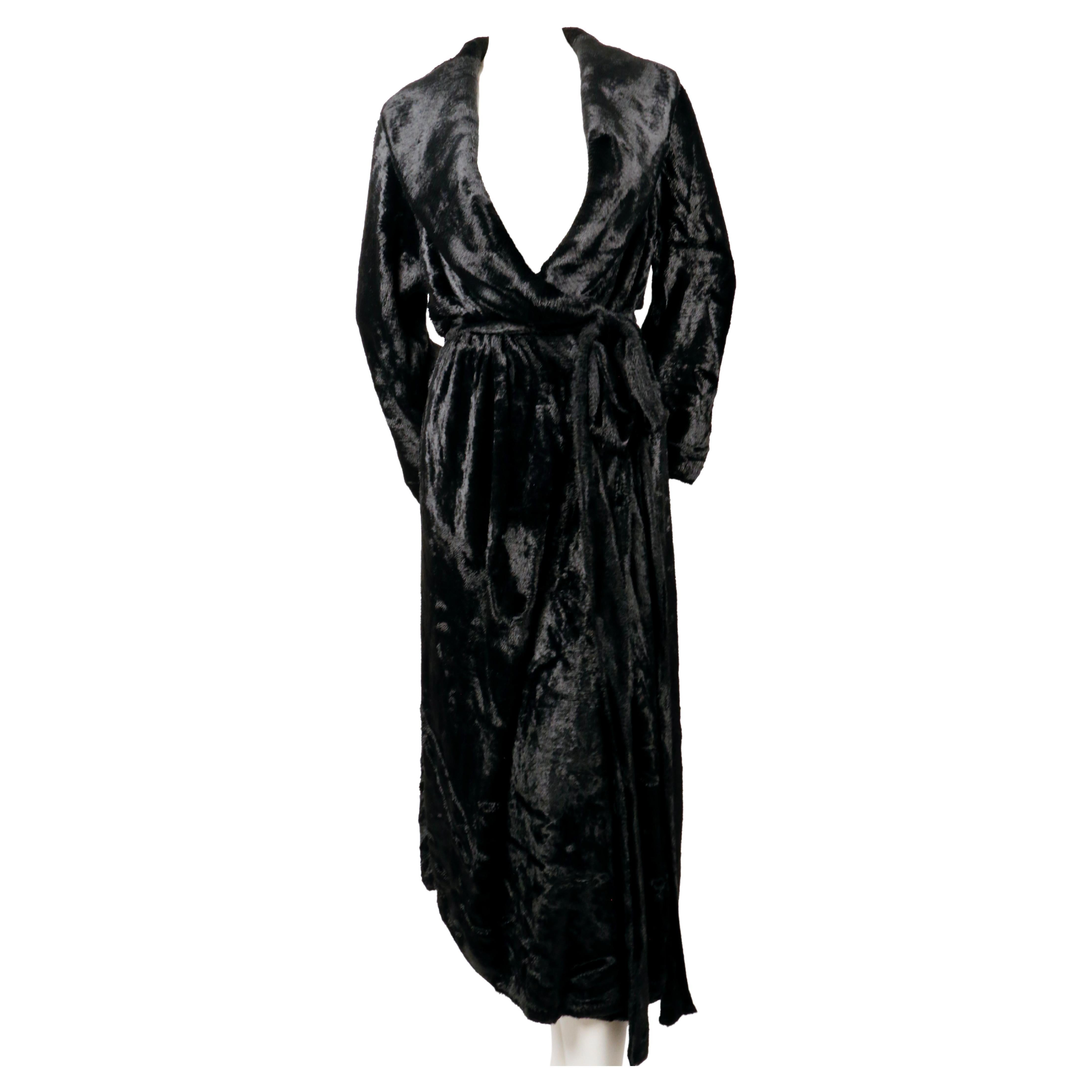 Very rare , jet-black, chenille robe coat with shawl collar and extra long belt designed by Azzedine Alaia dating to fall of 1992 as seen on the runway. Size XS but fits many sizes due to the oversized cut. Double button closure. Elasticized waist.