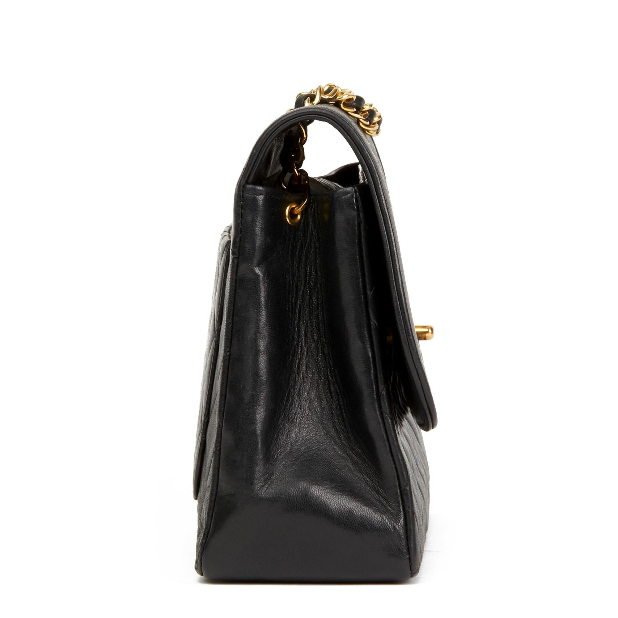 CHANEL
Black Quilted Lambskin Vintage Classic Single Flap Bag with Wallet

 Reference: HB2892
Serial Number: 2389625
Age (Circa): 1992
Accompanied By: Interior Wallet
Authenticity Details: Serial Sticker (Made In France)
Gender: Ladies
Type:
