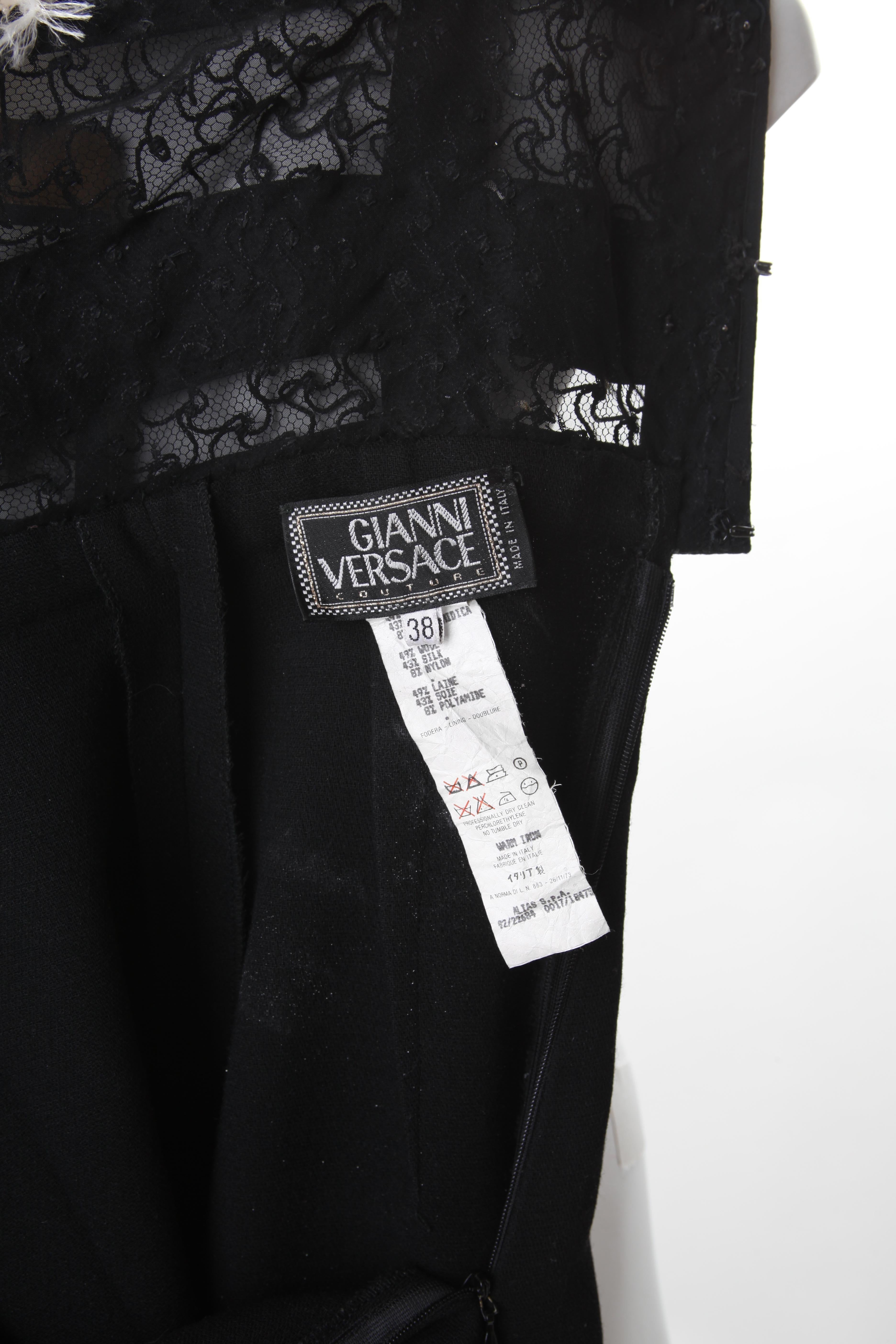 Combinaison bondage en laine noire avec médaillons Gianni Versace, 1992 Pour femmes en vente