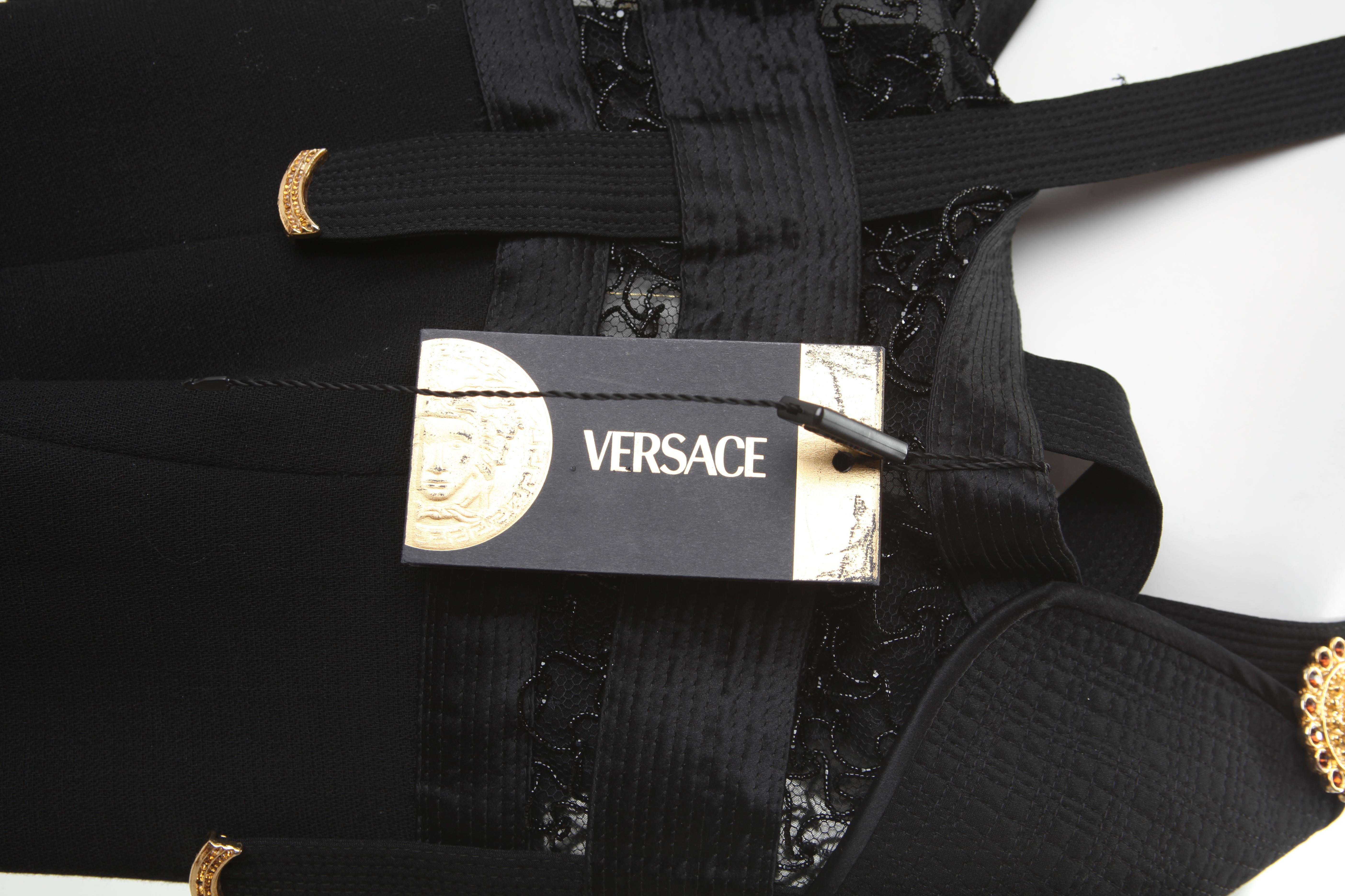 1992 Gianni Versace Bondage Black Wool Jumpsuit with Medallions In Excellent Condition For Sale In New York, NY