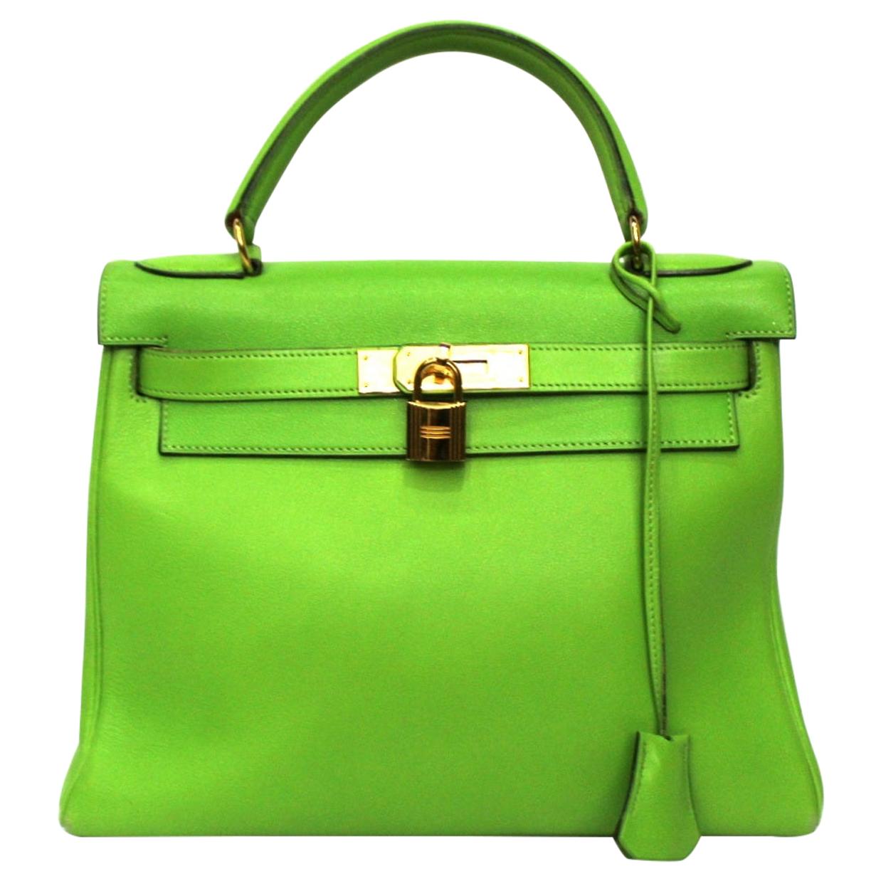 Rare Hermès Kelly 32 sellier handbag double straps in green box