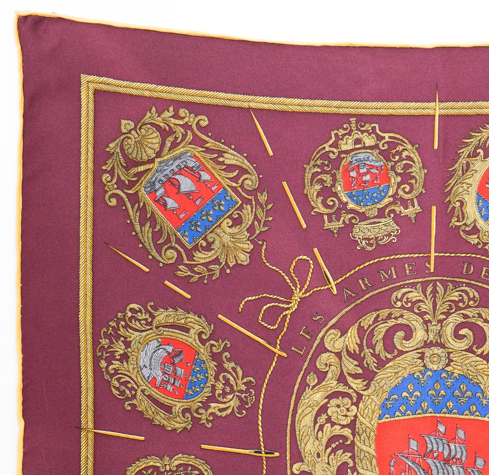 1992 Hermès Les Armes De Paris designed by Hugo Grygkar gavroche silk scarf featuring a bordeaux ground, a printed regal scene and a Hermes signature.
First edition 1954
16.9in (43cm) X 16.9in (43cm)
In good vintage condition. Made in France.
We