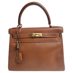 Bolso Kelly 28 de piel Hermes Noisette Lisse 1992