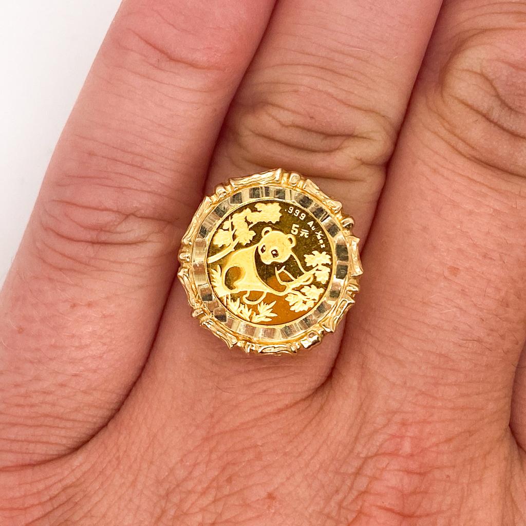 This bamboo frame coin ring is perfect for a panda or coin lover! Securely framed in this fabulous ring, the 1/20 oz. 1992 24 karat gold authentic Chinese 5 yuan panda coin shines with a rich warmth. This fabulous bamboo coin ring could make a