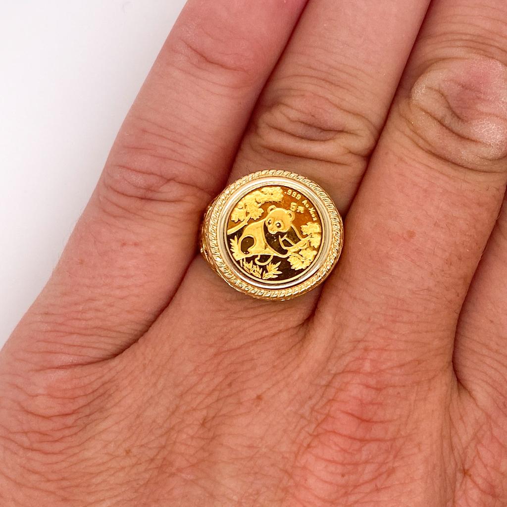 This filigree ring is perfect for a panda or coin lover! Securely framed in this beautiful ring, the 1/20 oz. 1992 24 karat gold authentic Chinese 5 yuan panda coin shines with a rich warmth. This fabulous filigree coin ring could make a perfect