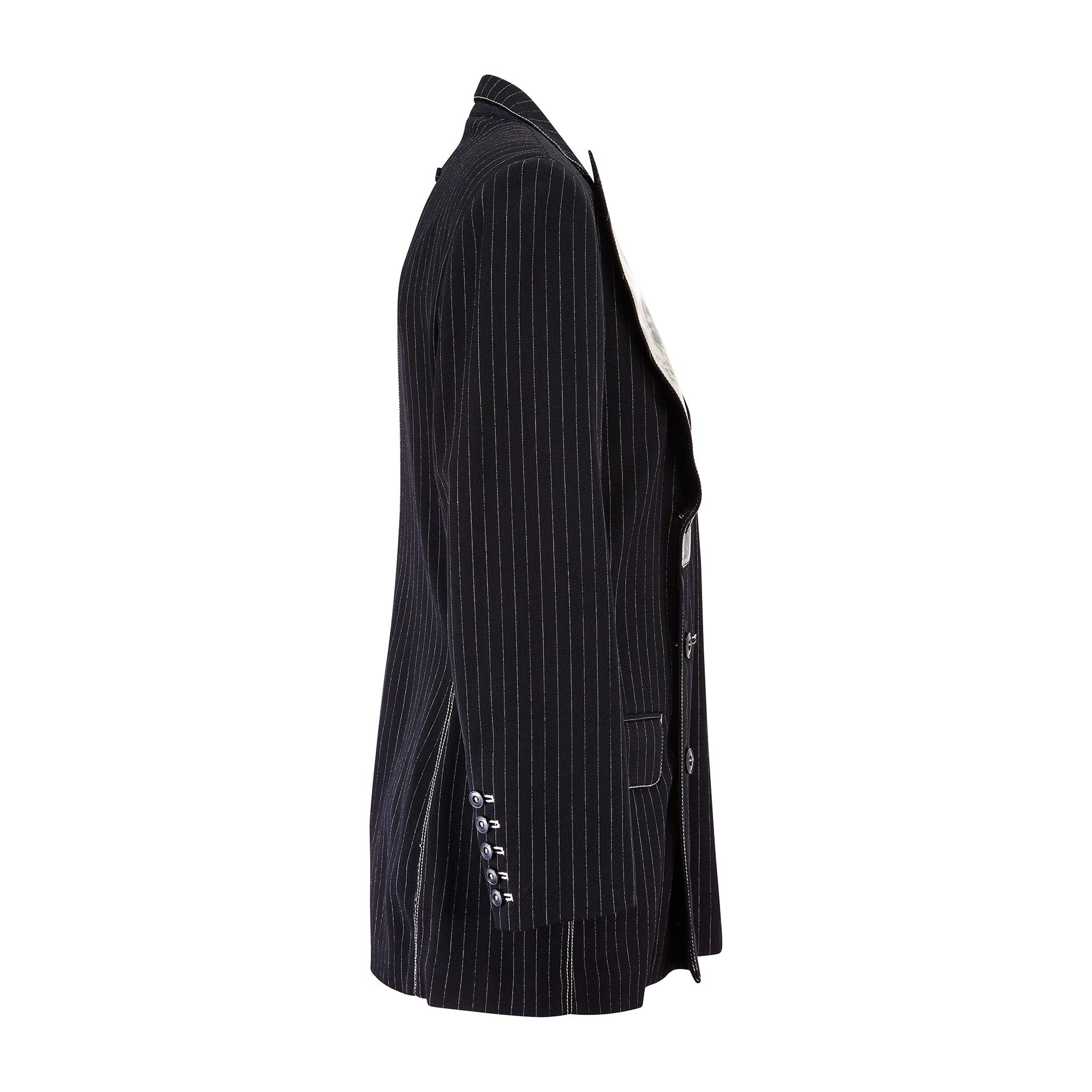 This well documented Jean Paul Gaultier jacket is a rare find and walked the runway in two colourways for the designer’s Fall 1992 collection as part of what is arguably the label’s most lauded era. A standout design which echos the sharp tailoring