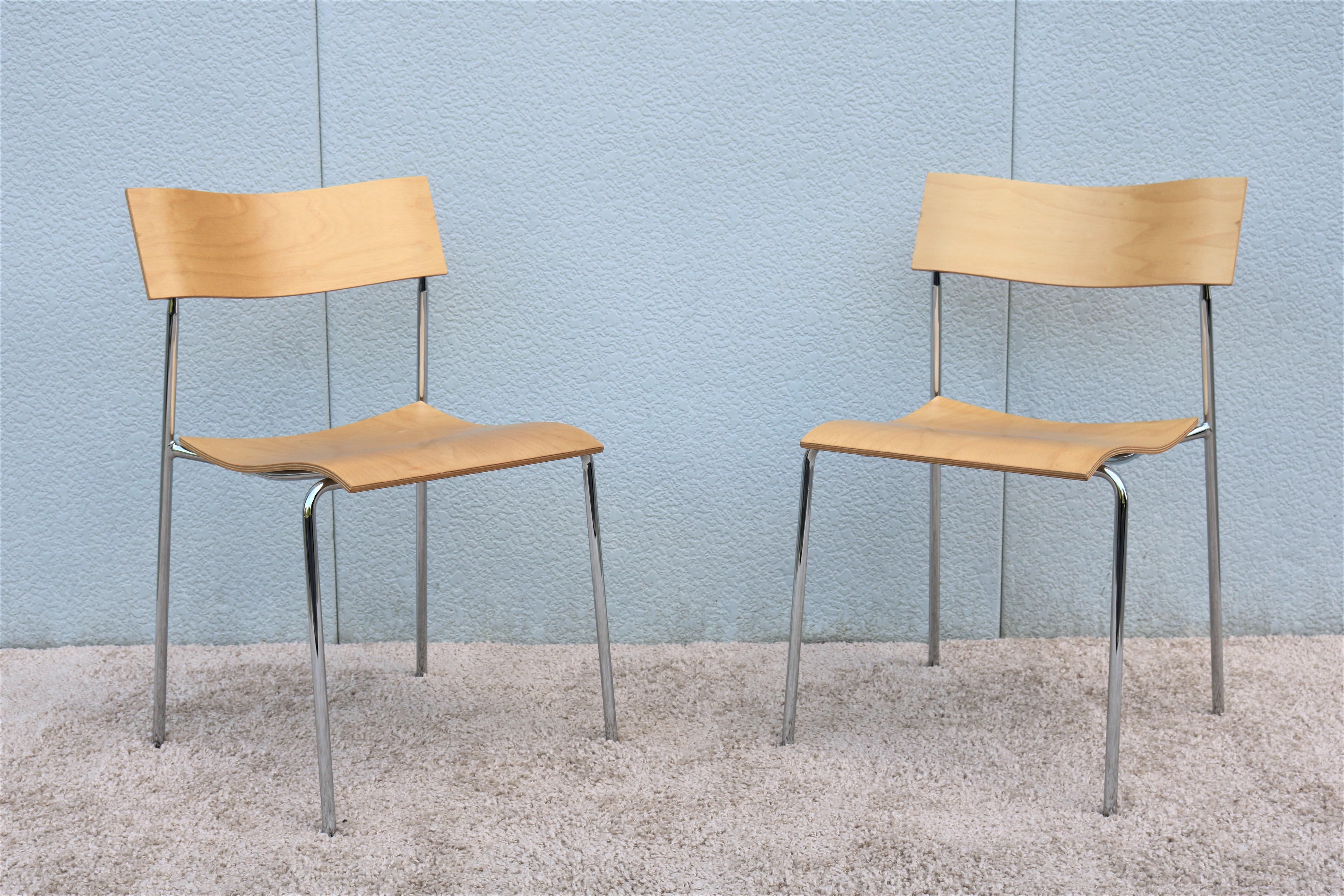 This elegant Swedish modern campus chairs were introduced in 1992 by the designer Johannes Foersom and Peter Hiort-Loranzen.
The lightweight design and stacking feature make it the perfect multi-purpose chair.
It's clean look and timeless design