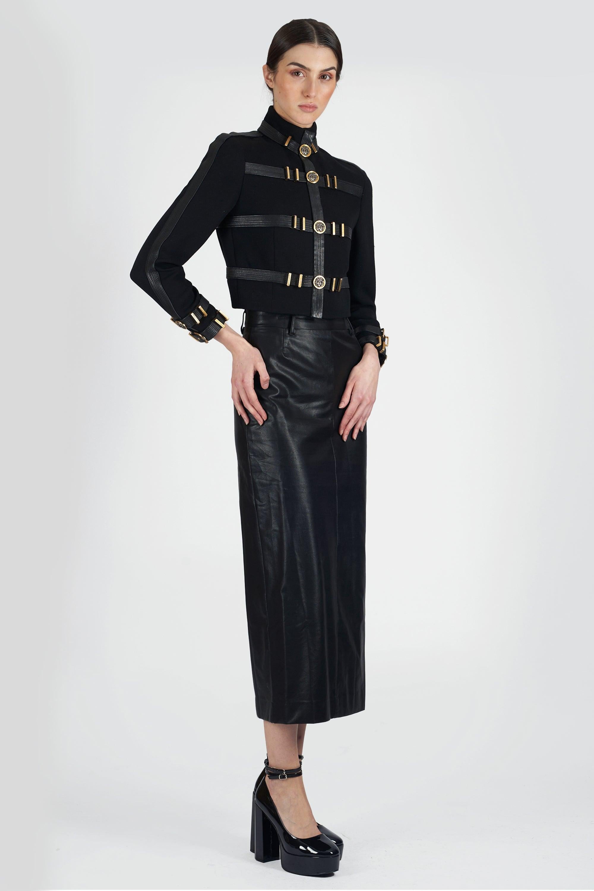 Gianni Versace 1992 ‘Miss S&M’ jacket. Features popper closure, cropped length, medusa head hardware and buckle detail. In excellent vintage condition. As seen on the runway.

Brand: Versace
Size: UK 8
Color: Black
Label size: 40 IT
Modern size: UK