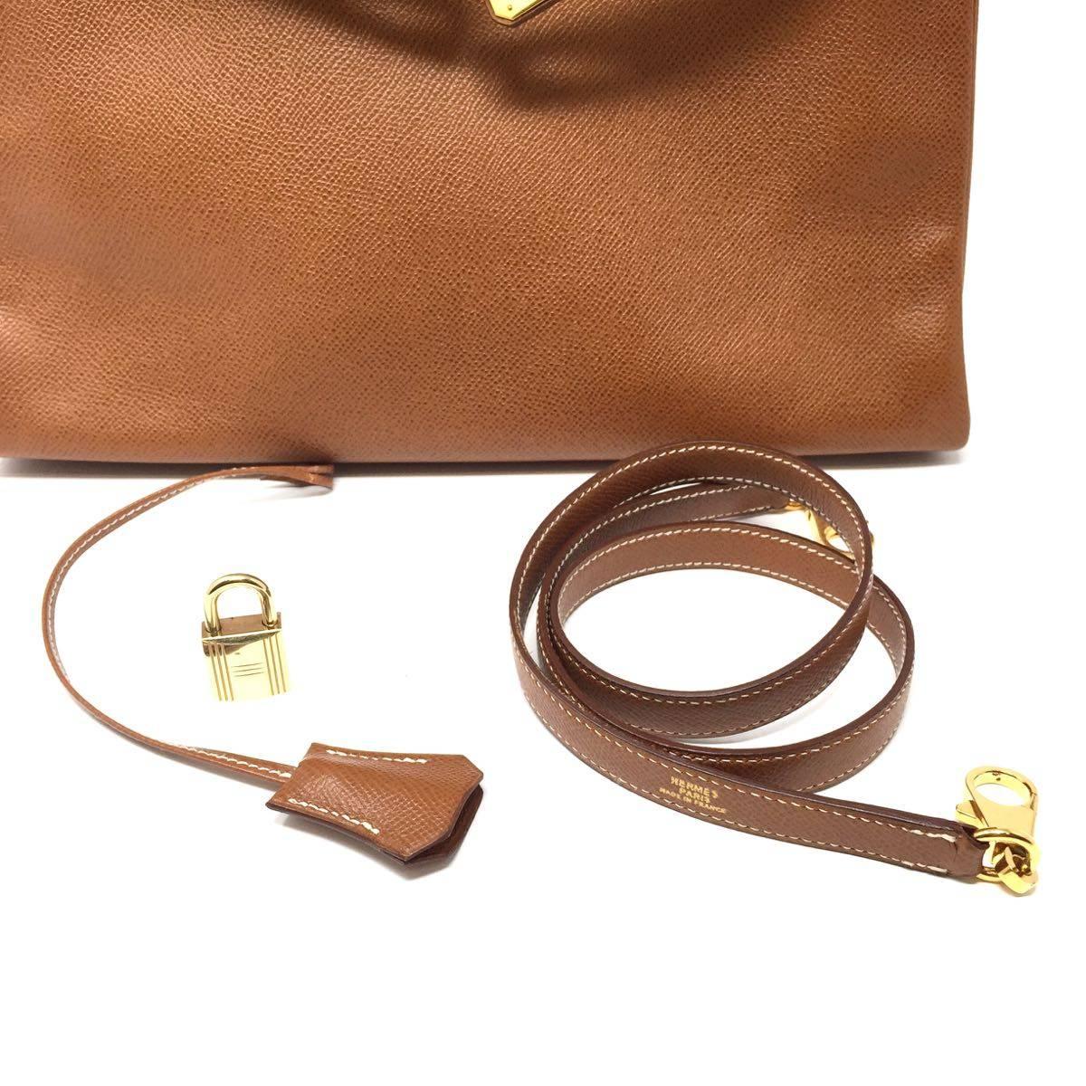 1992, HERMES Vintage  Sac Kelly 32 bag in Courchevel Gold Leather.  4