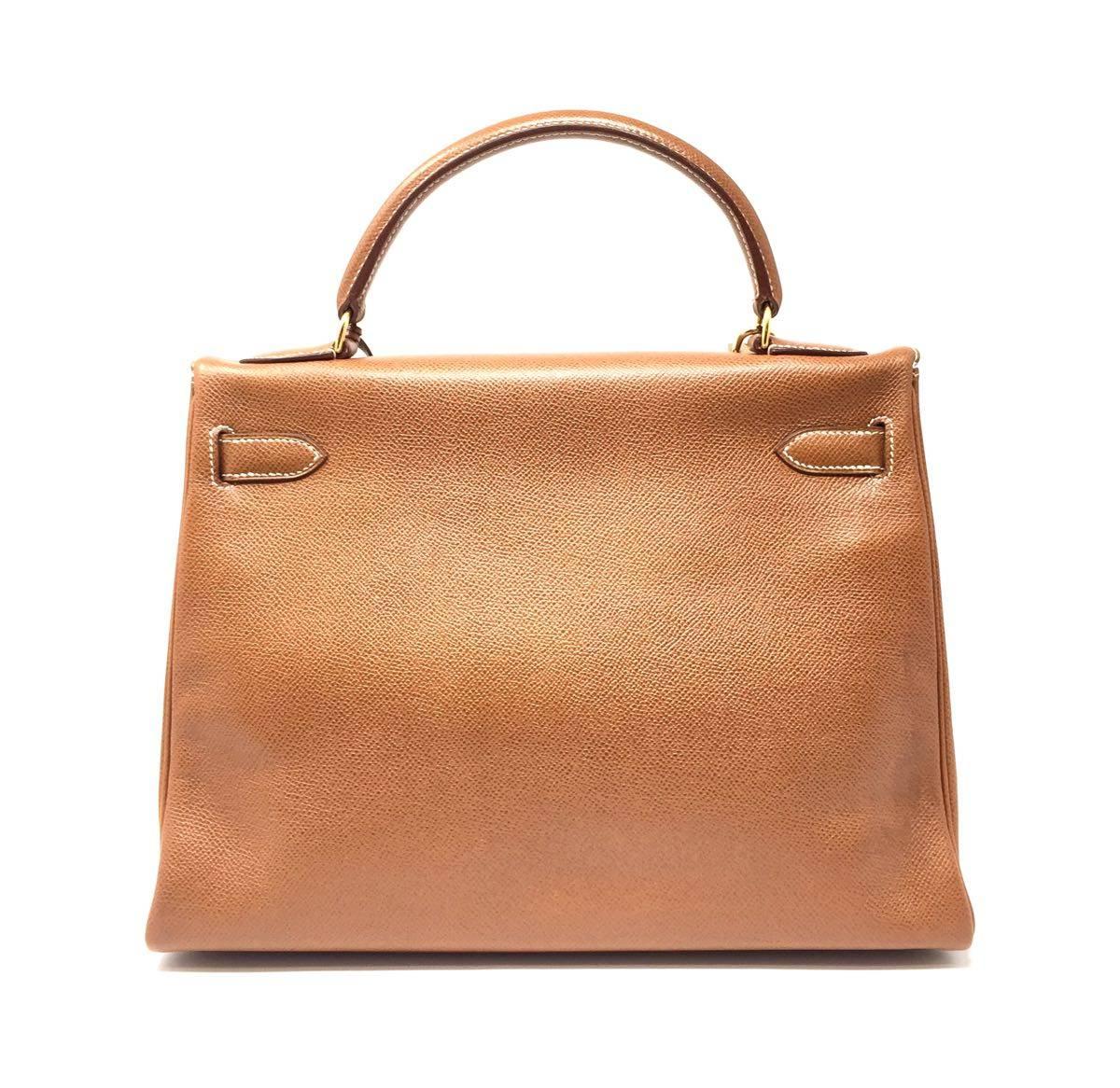 Brown 1992, HERMES Vintage  Sac Kelly 32 bag in Courchevel Gold Leather. 