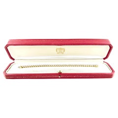 1993 Cartier Tennisarmband aus Gelbgold und Diamanten