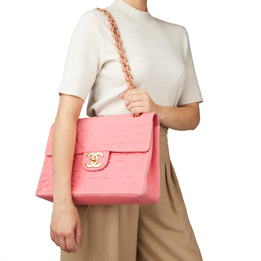 CHANEL
Pink Quilted Denim Vintage Maxi Jumbo XL Flap Bag

Xupes Reference: HB1859
Serial Number: 2042682
Age (Circa): 1993
Accompanied By: Chanel Dust Bag, Box, Authenticity Card
Authenticity Details: Authenticity Card, Serial Sticker (Made in