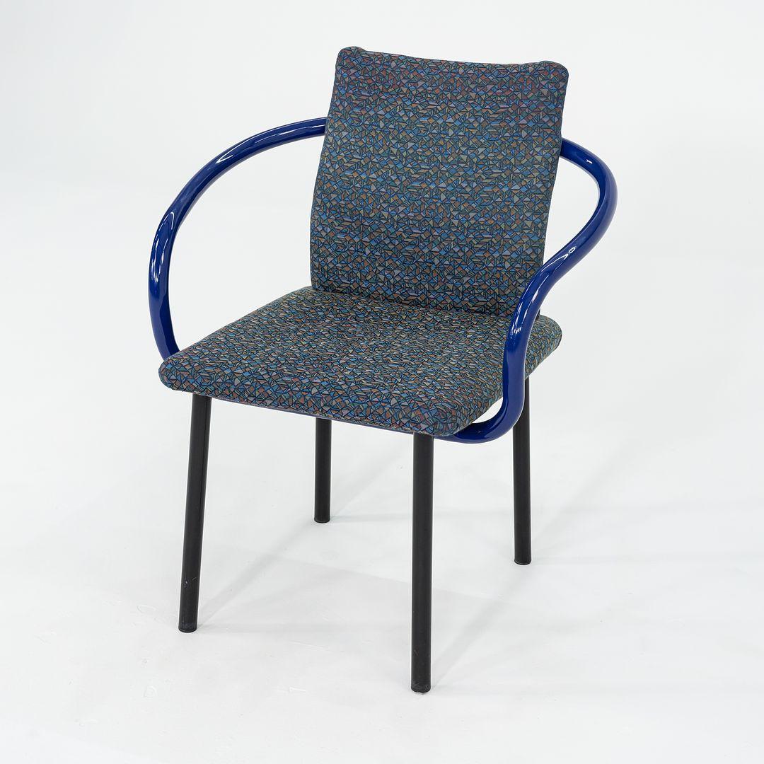 These are Mandarin Chairs, designed by Ettore Sottsass and produced by Knoll in 1986. The listed price includes one chair, and we have three available for purchase in this colorway. These examples show a production date of 1993. They have