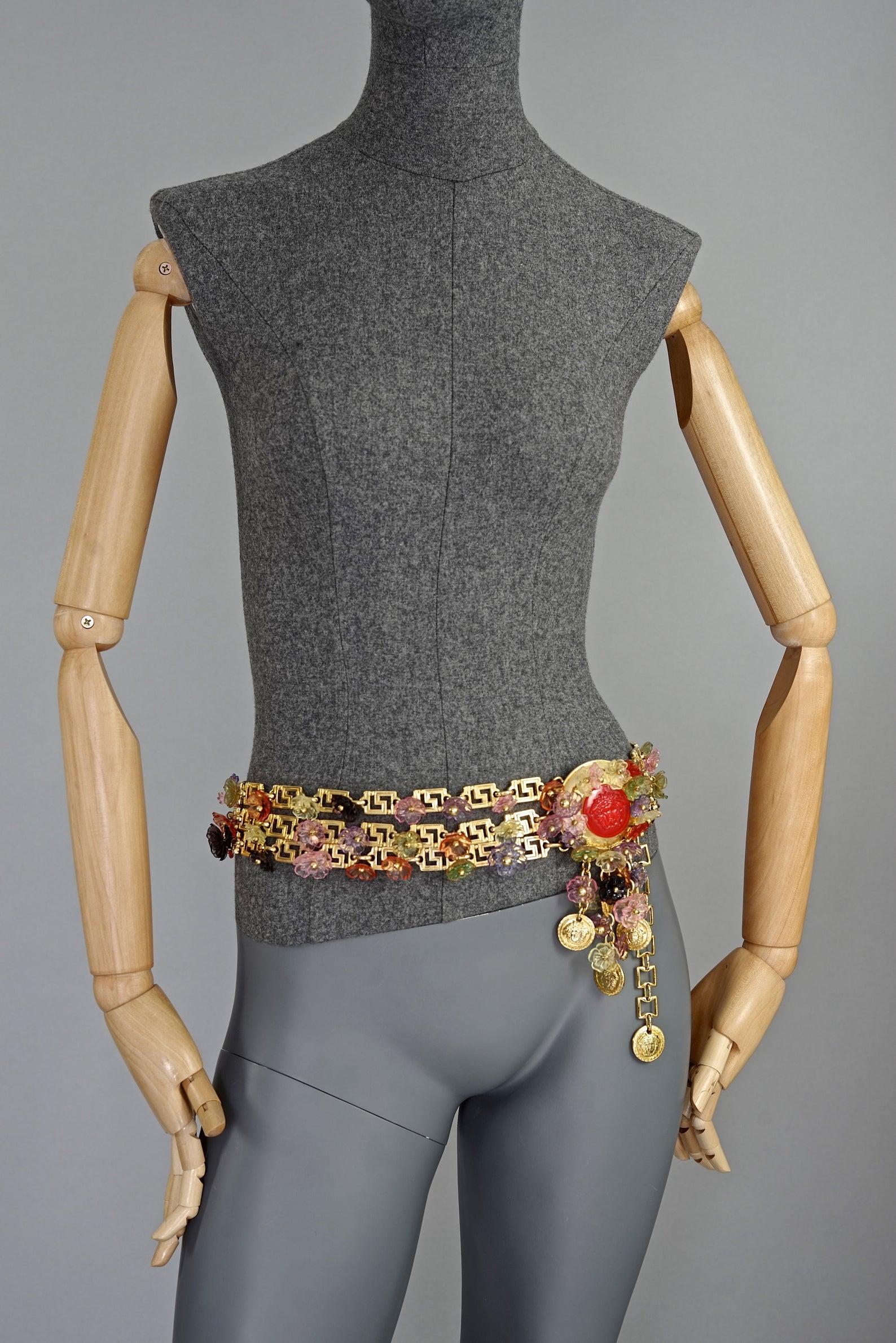 A rare collectors' piece from GIANNI VERSACE 1993 Spring/ Summer collection.

Features:
- 100% Authentic GIANNI VERSACE.
- Colourful flowers in resin, Medusa heads and greek keys tiered chain.
- Signed GIANNI VERSACE Made in Italy.
- Excellent
