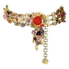 GIANNI VERSACE Ceinture à volants avec médaillon Medusa fleuri, 1993