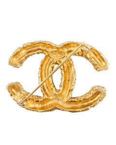 Spilla Florentine CC color oro del 1993