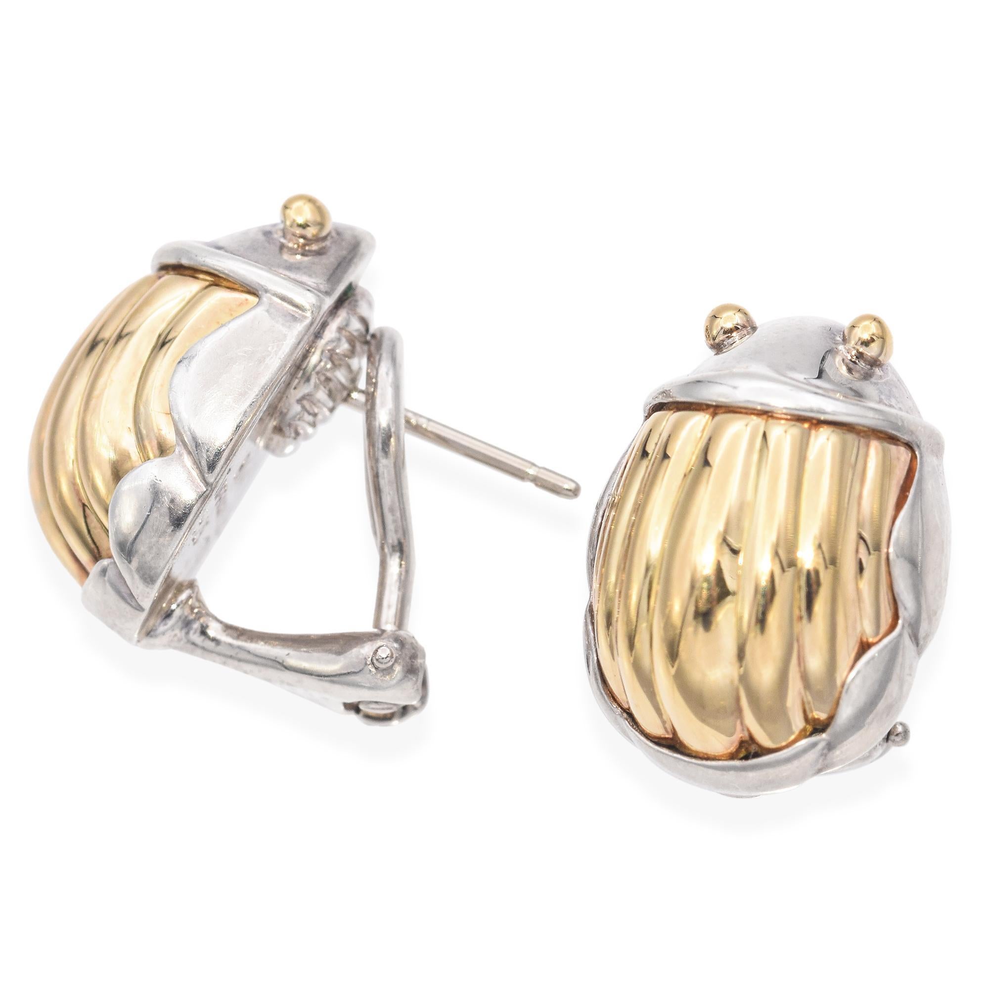 Elevate your jewelry collection with these iconic Tiffany & Co. Scarab Beetle Earrings, a stunning blend of 18K yellow gold and sterling silver. Inspired by the ancient symbol of renewal and protection, these earrings showcase a sculptural scarab
