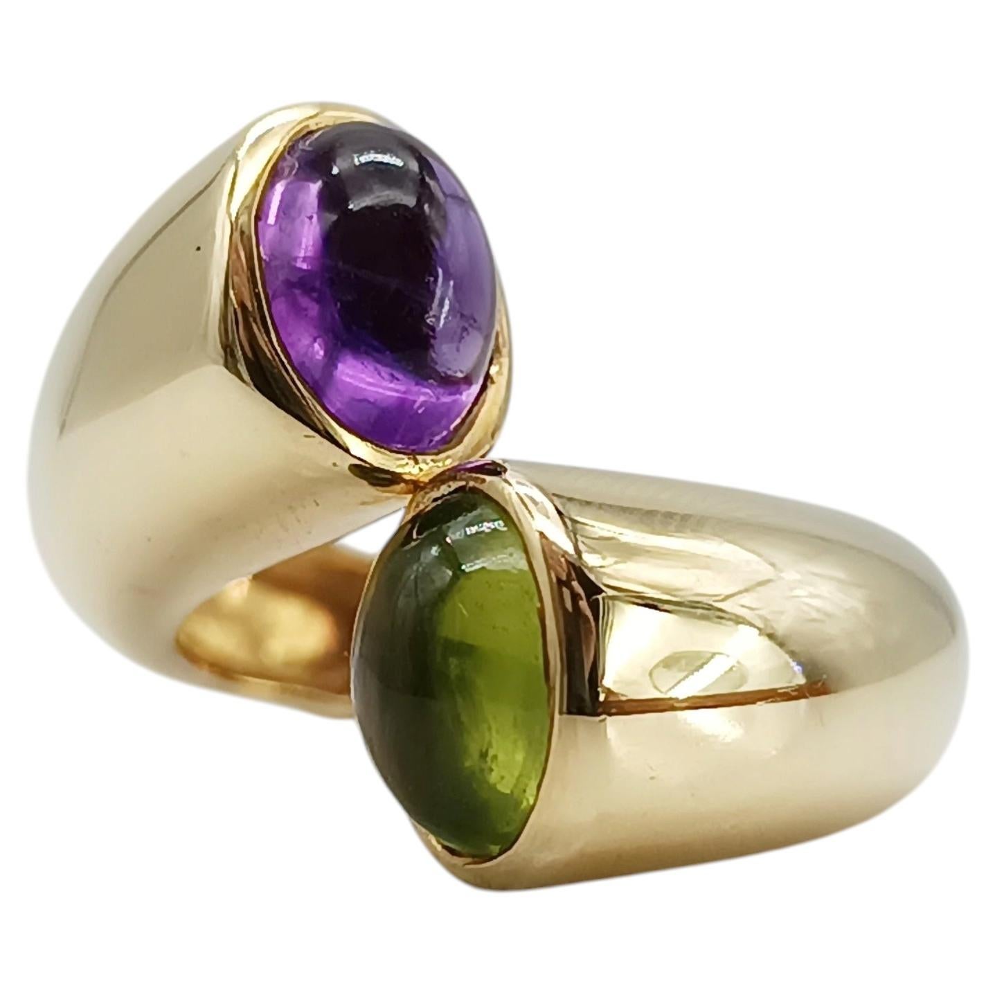 Anillo tipo «bypass» de 1994, de oro amarillo de 18 quilates con amatista y peridoto