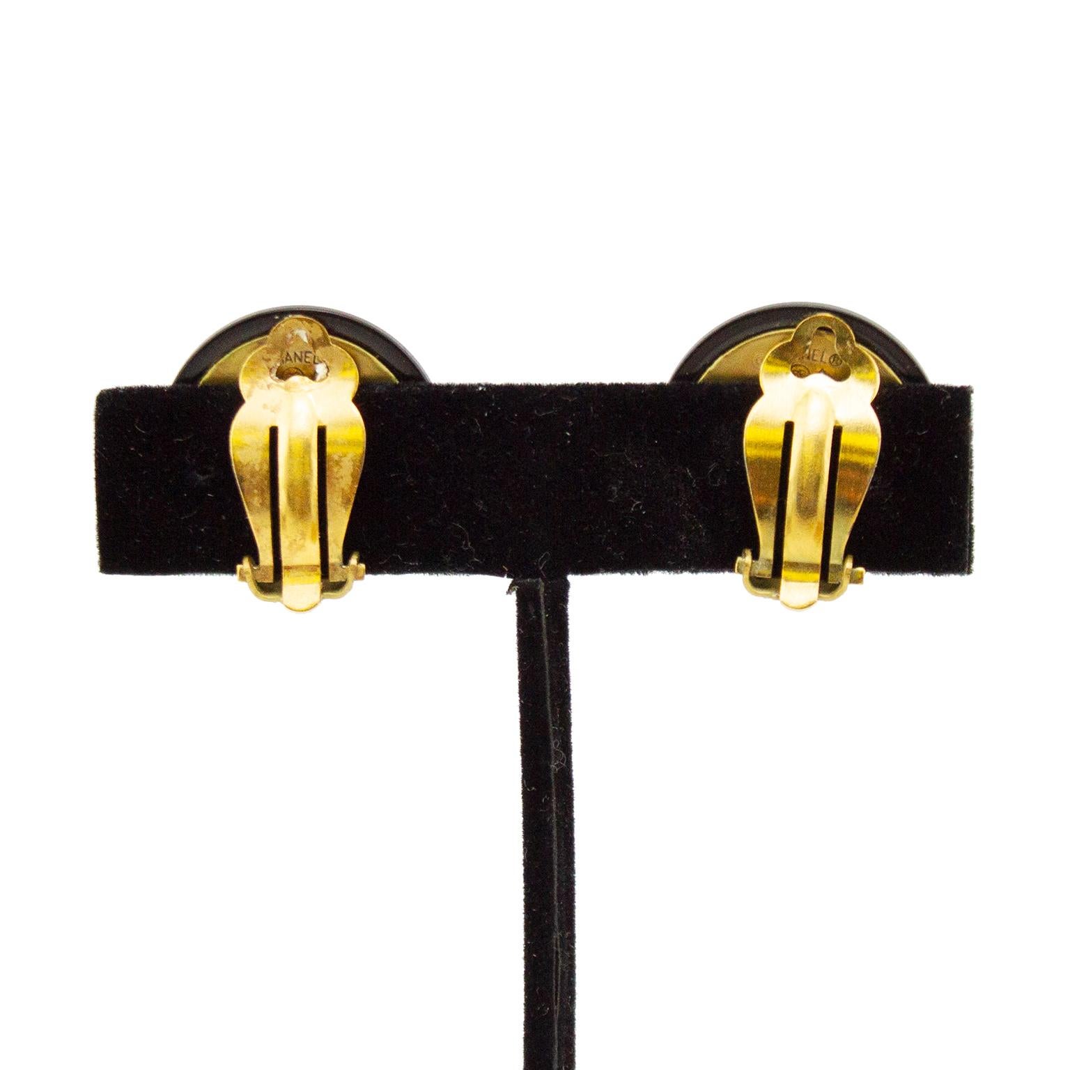 Chanel clip on earrings from the Autumn 1994 collection. Small black resin buttons with gold tone metal rooster details. Backs are gold tone metal clips with Chanel markings. Excellent vintage condition. Perfect gift for anyone who is the year of