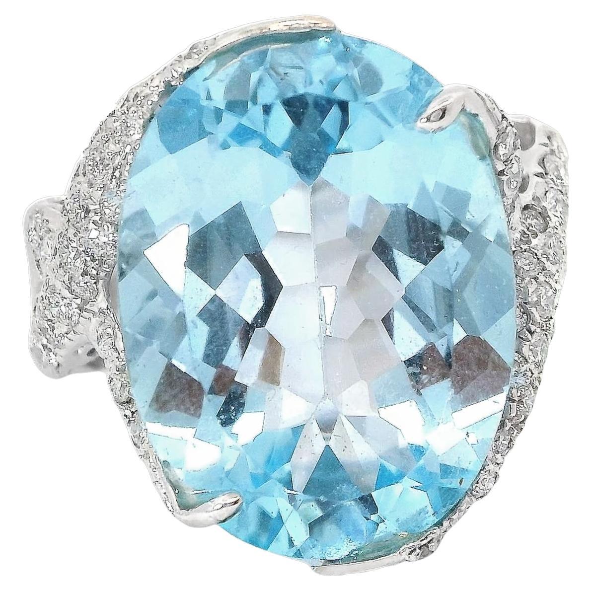 19.94 Carat Oval Blue Topaz Ring with Diamond Pavé