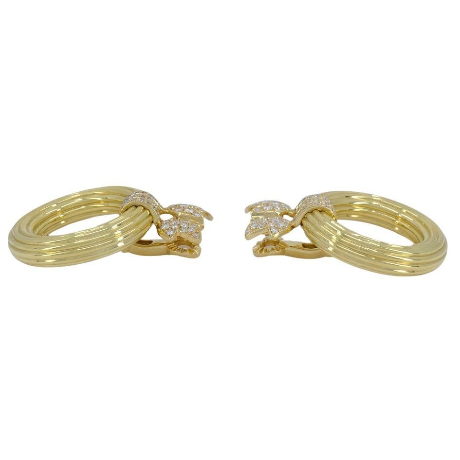 1994 Boucles d'oreilles Clips de Cartier en or 18 carats et diamants Bon état - En vente à Beverly Hills, CA