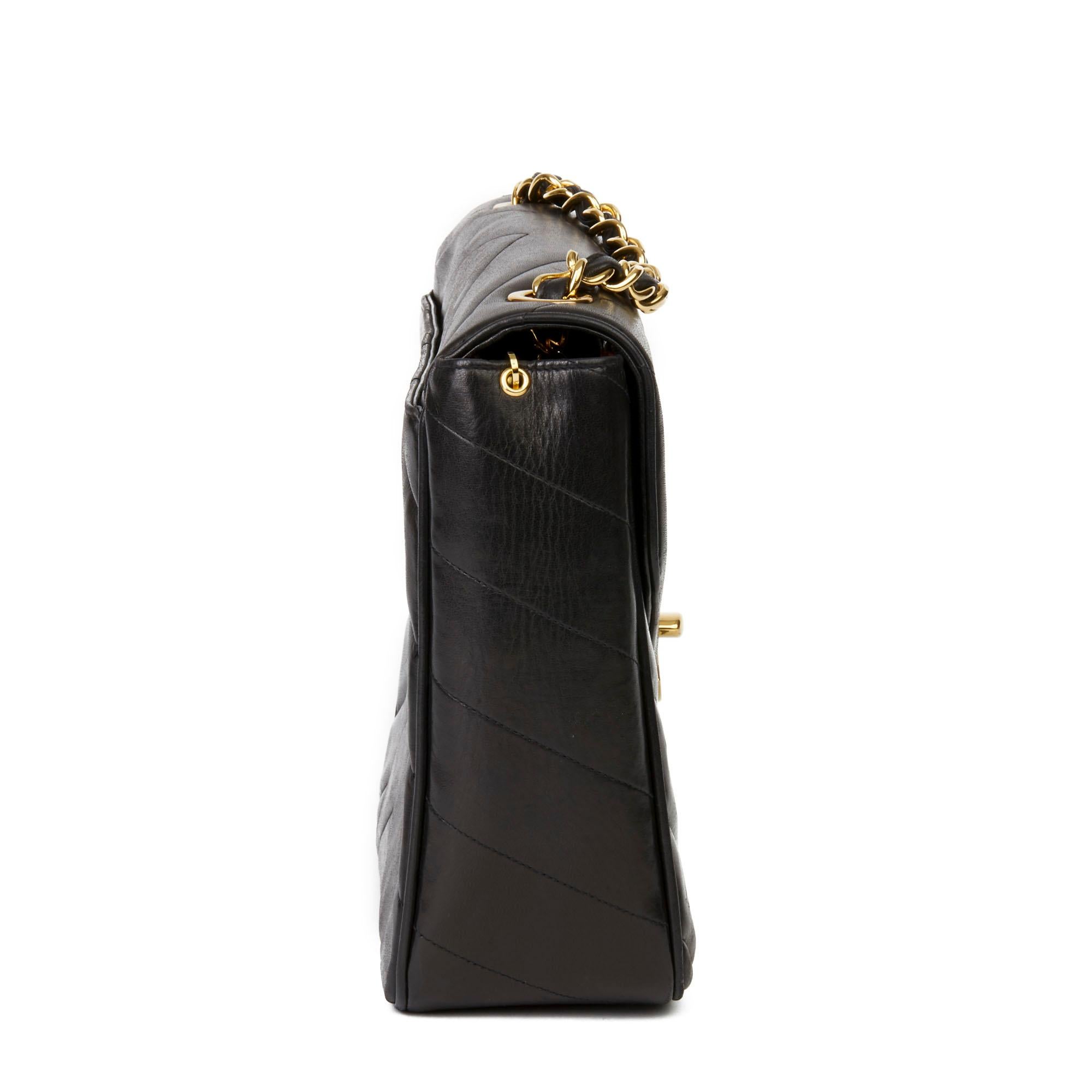 CHANEL
Black Chevron Quilted Lambskin Vintage Jumbo XL Classic Single Flap Bag

Xupes Reference: HB3173
Serial Number: 3259109
Age (Circa): 1994
Accompanied By: Chanel Dust Bag, Box, Authenticity Card
Authenticity Details: Authenticity Card, Serial