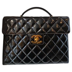 1994 Chanel black patent leather 24kt gold plated hardware briefcase handbag