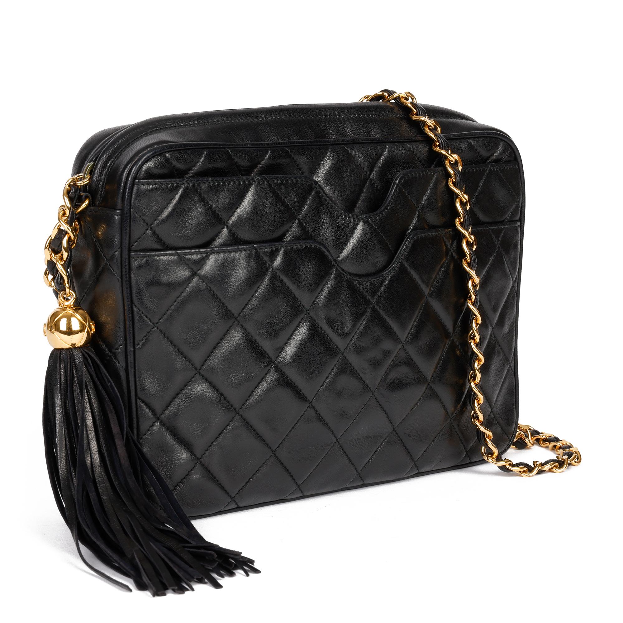 CHANEL
Black Quilted Lambskin Leather Vintage Classic Fringe Camera Bag

Xupes Reference: HB3899
Serial Number: 2657863
Age (Circa): 1994
Authenticity Details: Serial Sticker (Made in Italy)
Gender: Ladies
Type: Shoulder, Crossbody

Colour: