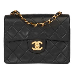 1994 Chanel Black Quilted Lambskin Vintage Mini Flap Bag