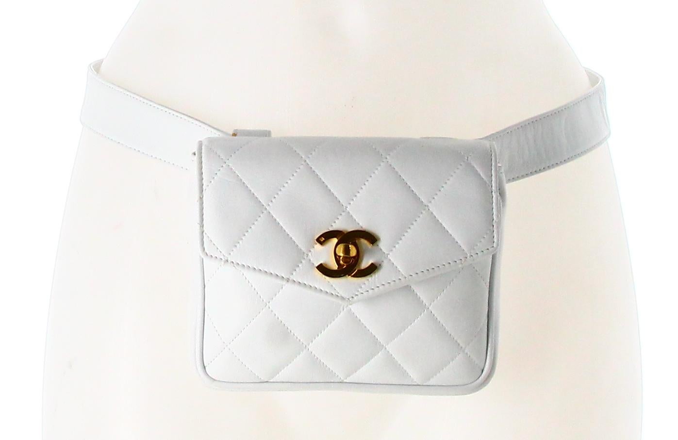 1994 Chanel CC Flap White Belt Bag

- Good condition. Shows signs of wear over time. 
- Chanel belt bag 
- White quilted leather
- Chanel golden logo clasp 
- Inside: white leather plus white belt