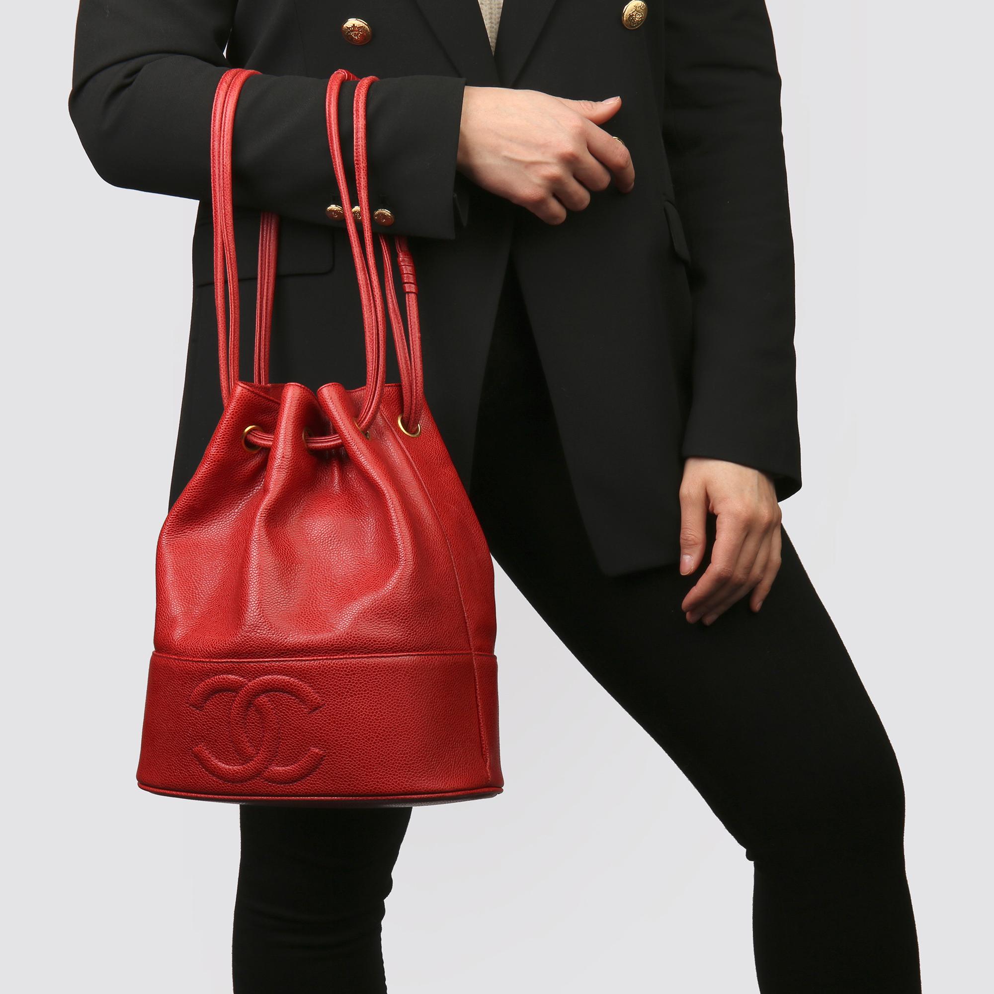 CHANEL 
Red Caviar Leather Timeless Bucket Bag with Pouch

Xupes Reference: HB3623
Serial Number: 2355647
Age (Circa): 1994
Accompanied By: Authenticity Card, Pouch
Authenticity Details: Authenticity Card, Serial Sticker (Made in Italy) 
Gender: