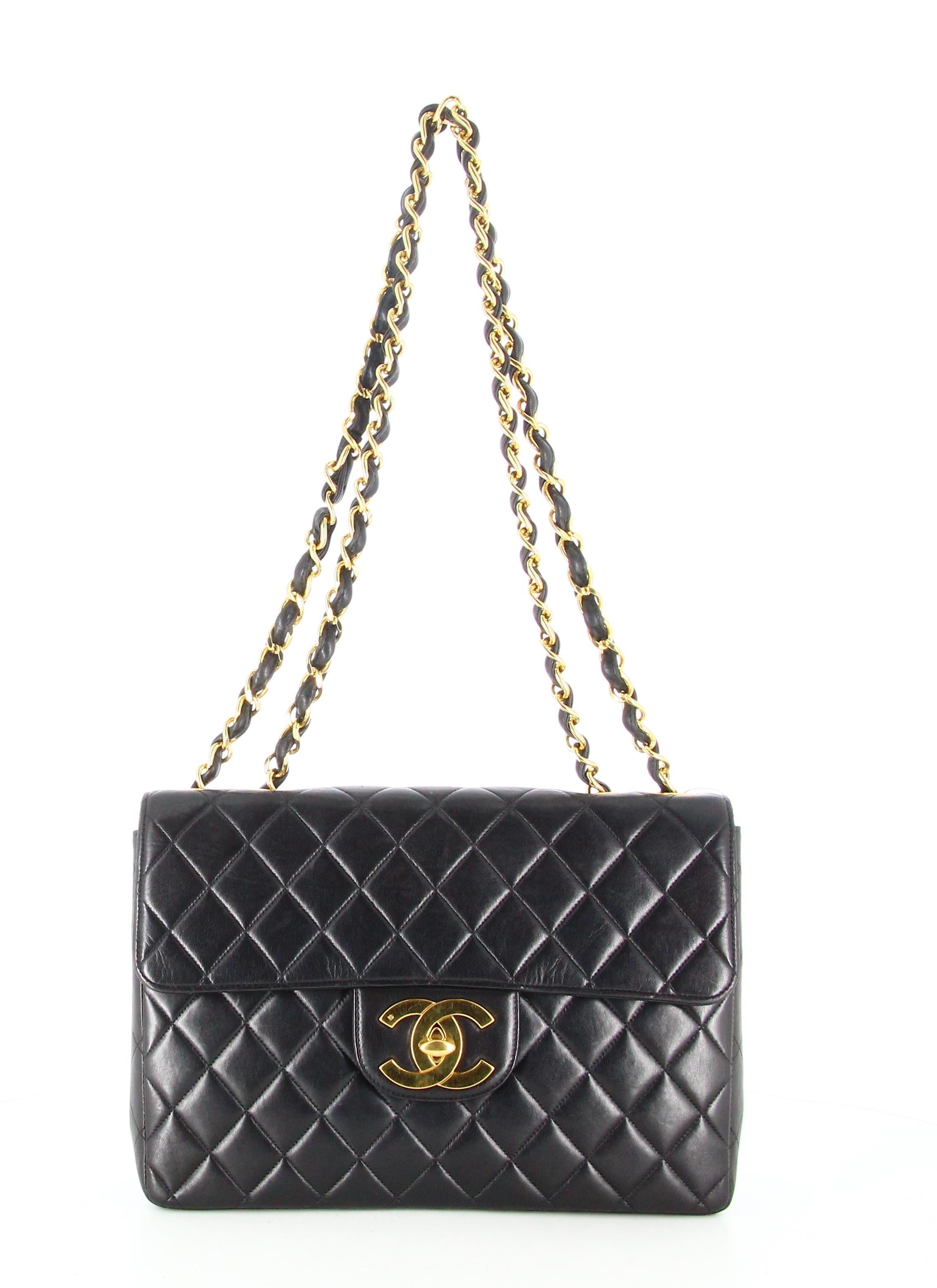 1994 Chanel Timeless Jumbo Quilted Handbag Black Golden 

- Good condition. Shows signs of wear and tear over time.
- Chanel timeless handbag
- Black quilted 
- Lambskin leather 
- Clasp: Double C golden 
- Double golden chain and black leather 
-