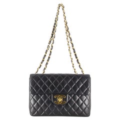 1994 Chanel Timeless Jumbo Quilted Handbag Black Golden