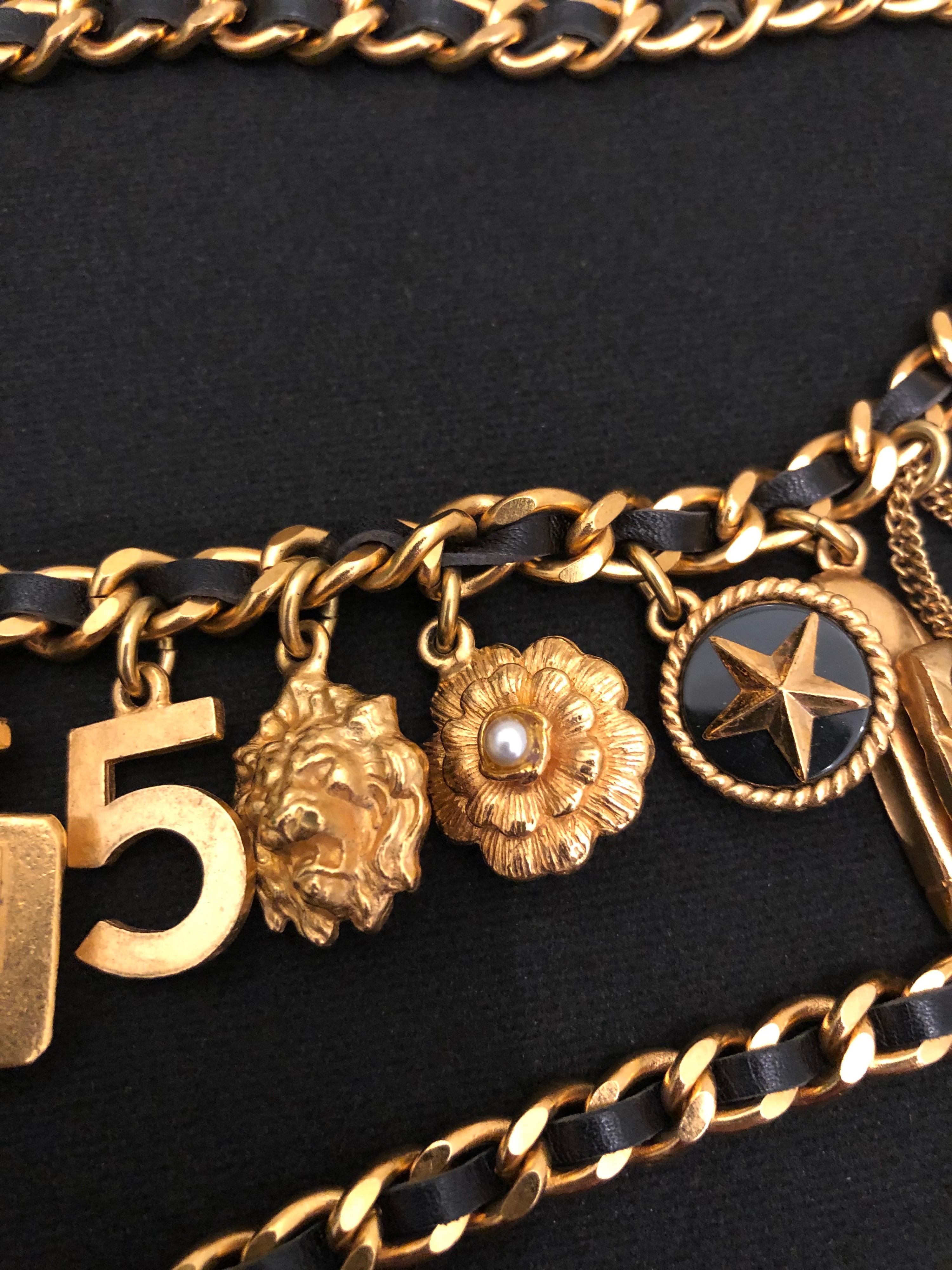 1994 Vintage Runway CHANEL Gold Toned Leather Chain Charm Belt Lion Camellia  In Excellent Condition In Bangkok, TH
