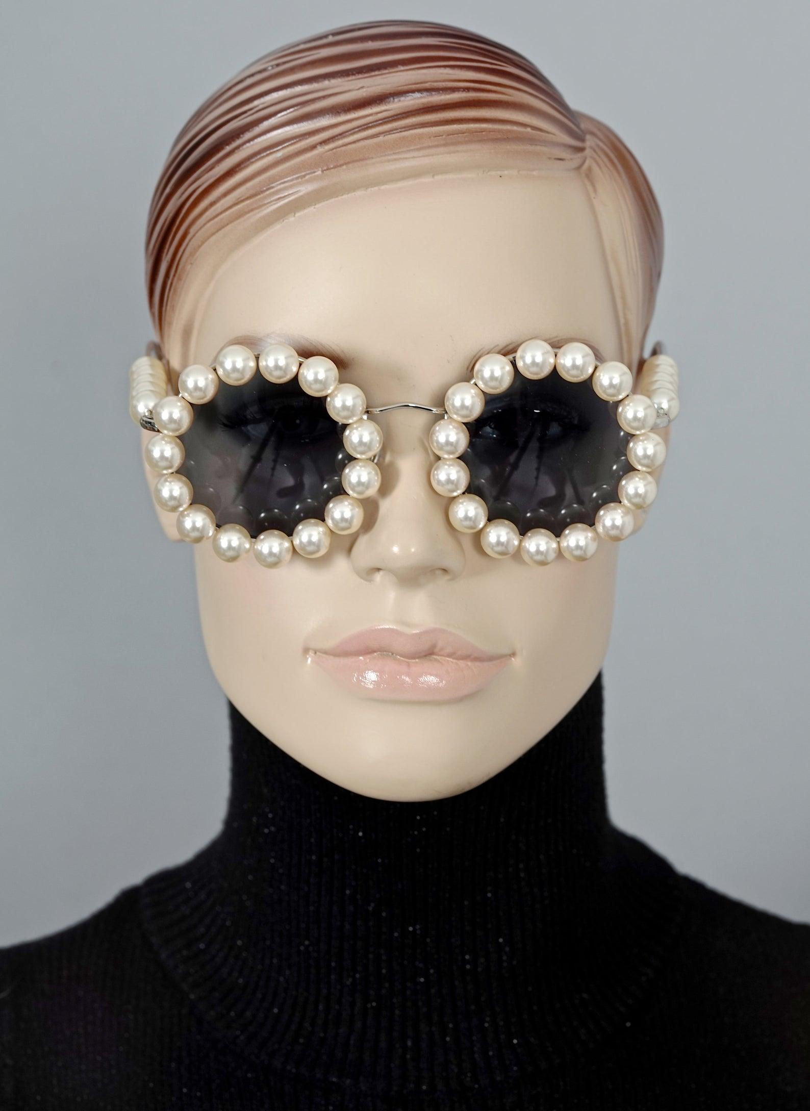 As seen on Rihanna.
From CHANEL Spring/ Summer 1994 collection.

Features:
- 100% Authentic CHANEL. 
- Pearl round sunglasses with metal frame.
- Silver hardware.
- Signed CHANEL Made in Italy 03526 Z0020 .
- Excellent vintage