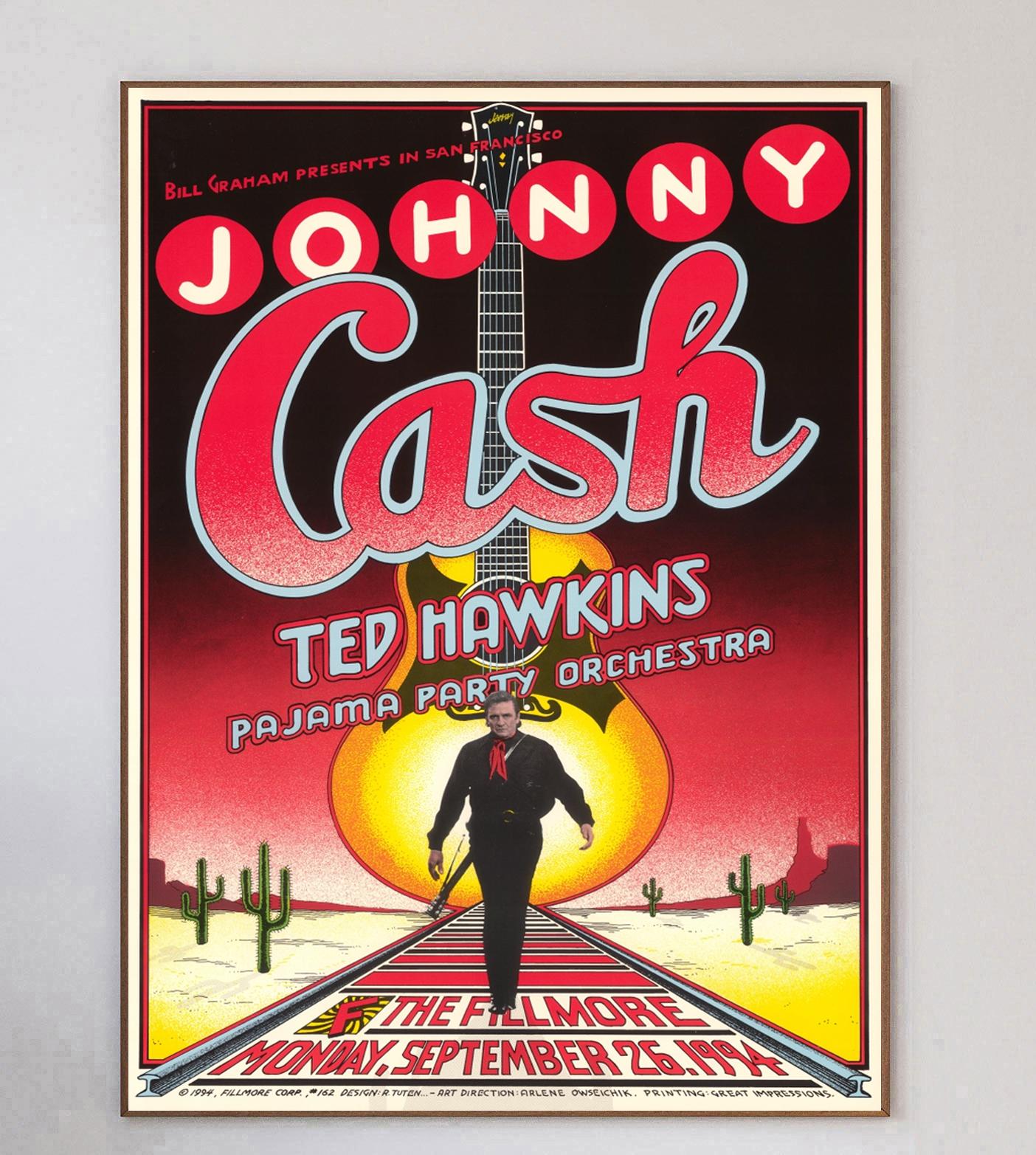 Designed by legendary concert poster artist Randy Tuten, this beautiful poster was created in 1994 to promote a live concert of Johnny Cash at the world famous Fillmore in San Francisco. Bill Graham events such as this were well known for their now