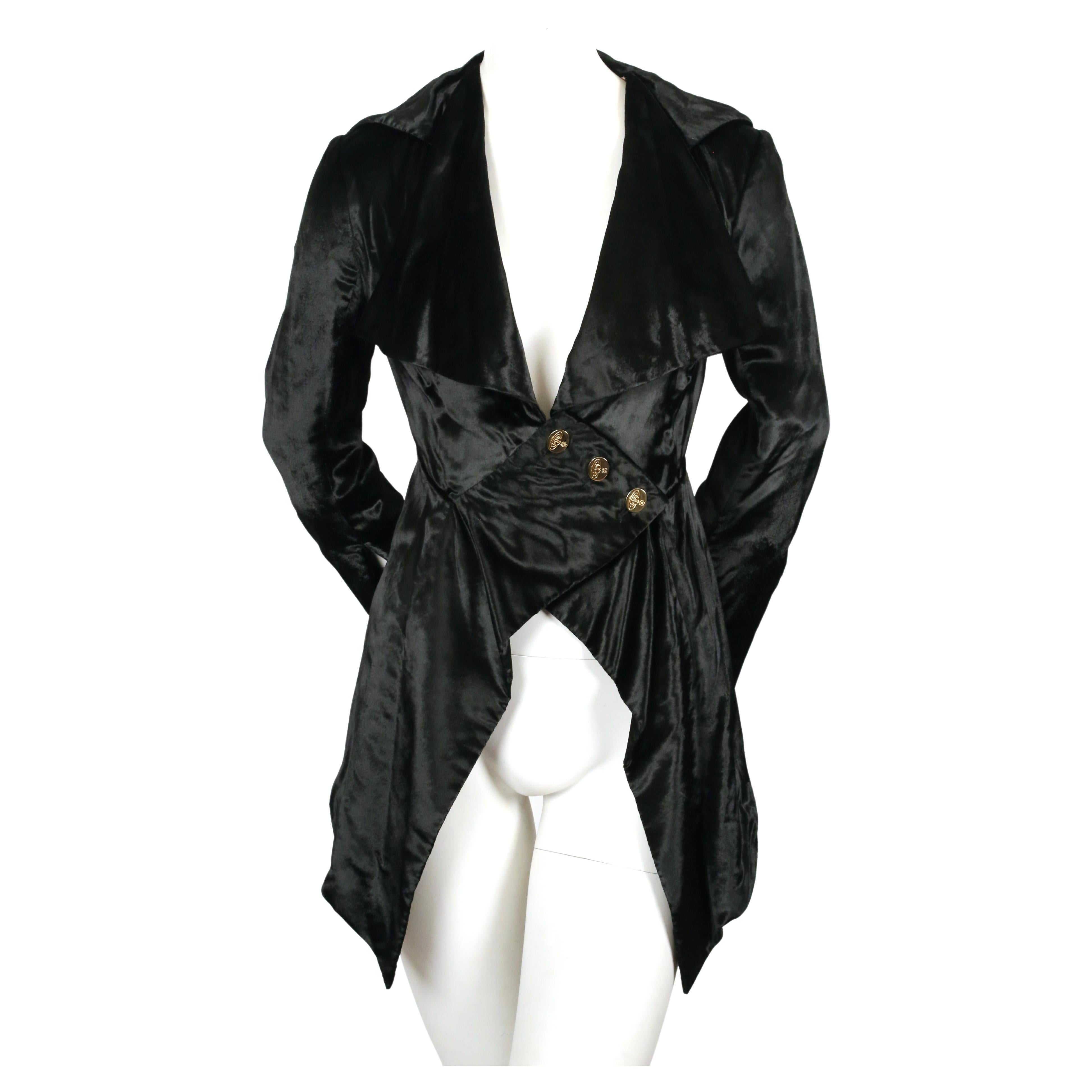 Very rare, jet-black, brushed velvet frock coat designed by Vivienne Westwood dating to her 1994 'On Liberty' collection as seen on the runway. Vivienne Westwood gold label which was her top range with very limited numbers made. 

Labeled a UK size