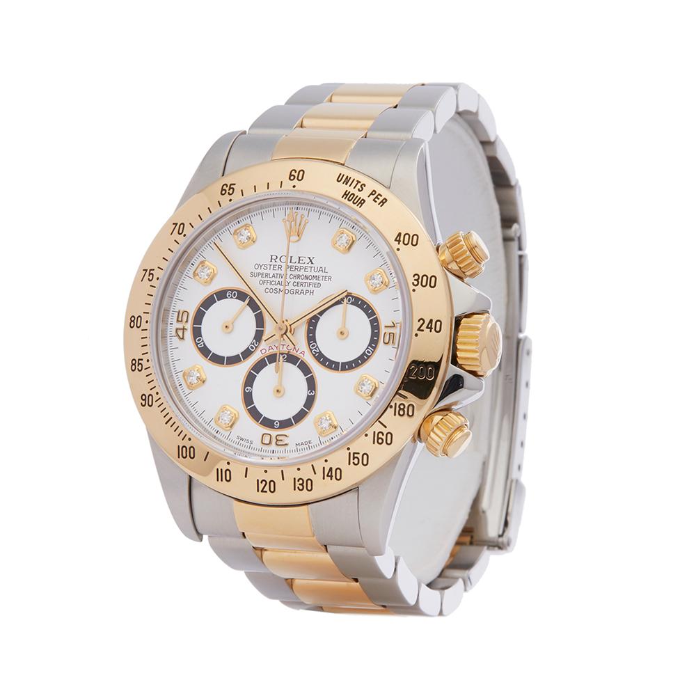 Contemporary 1994 Rolex Daytona Steel & Yellow Gold 16523 Wristwatch
 *
 *Complete with: Box Only dated 1994
 *Case Size: 40mm
 *Strap: Stainless Steel & 18K Yellow Gold Oyster
 *Age: 1994
 *Strap length: Adjustable up to 18cm. Please note we can