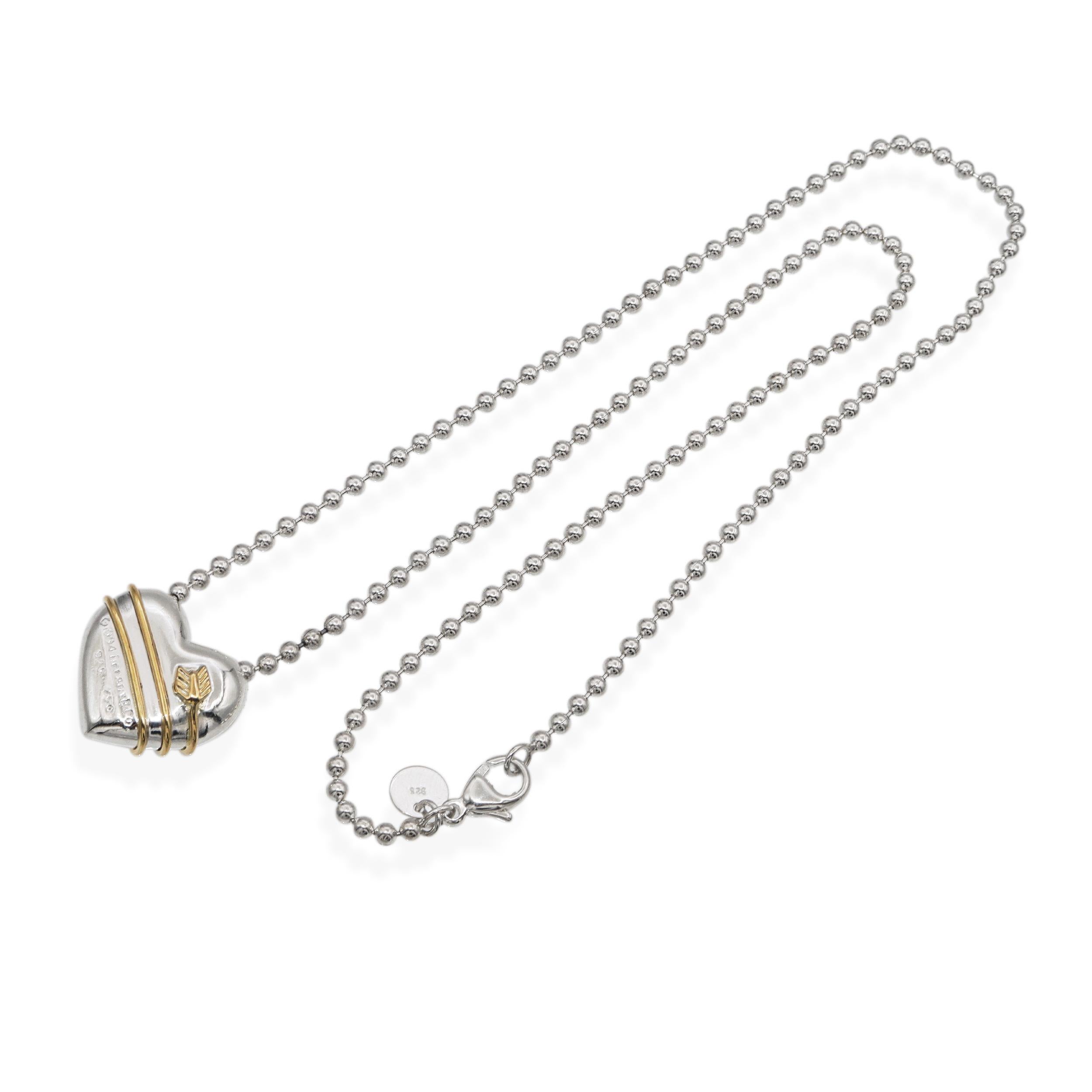 da uomo o donna 1994 Tiffany & Co. Collana a cuore in argento sterling e oro giallo 18 carati in vendita