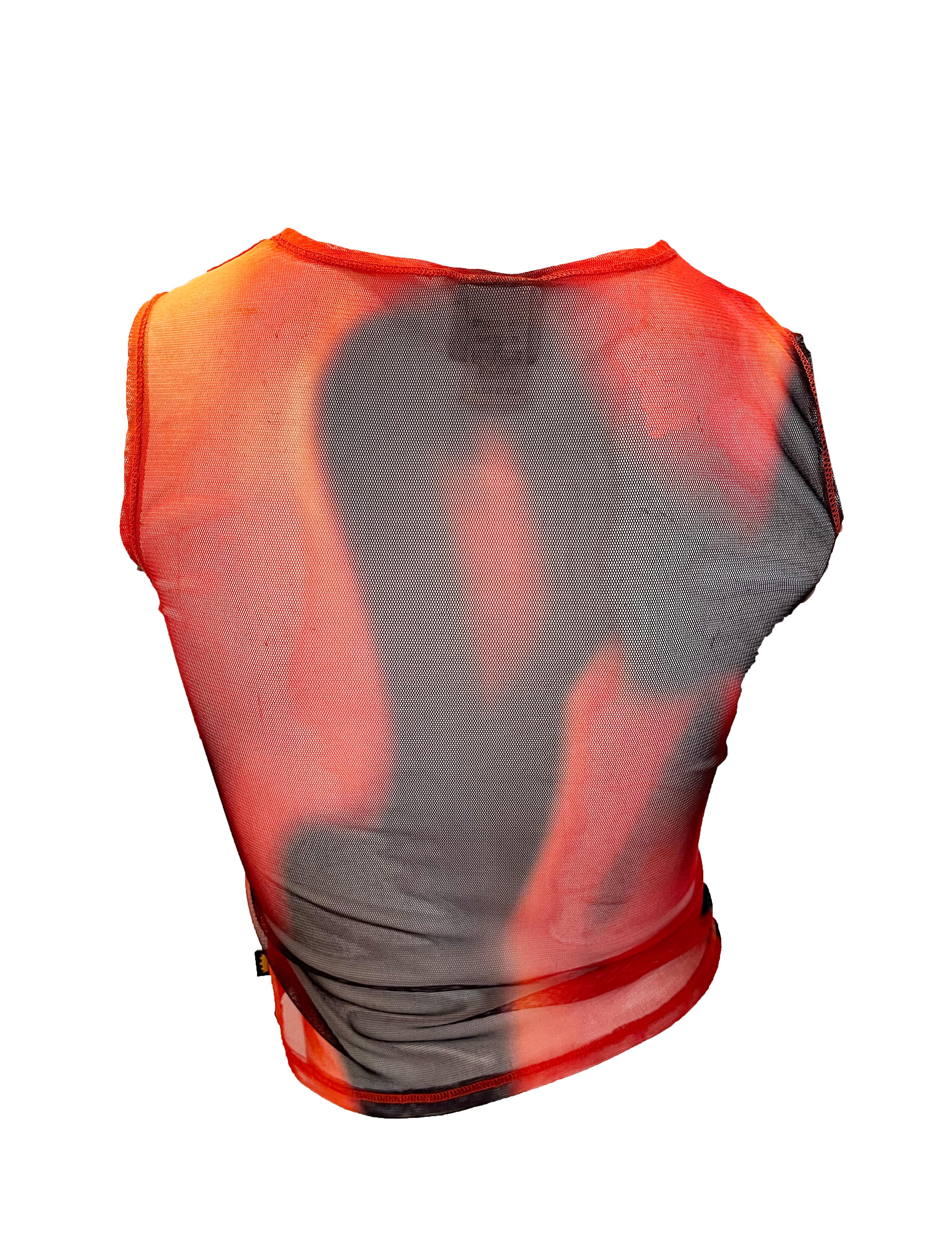 1994 Todd Oldham T-Shirt aus reinem Stretch-Flamme. Zustand: Ausgezeichnet
100% Polyester. Größe Small
Brustumfang: 26