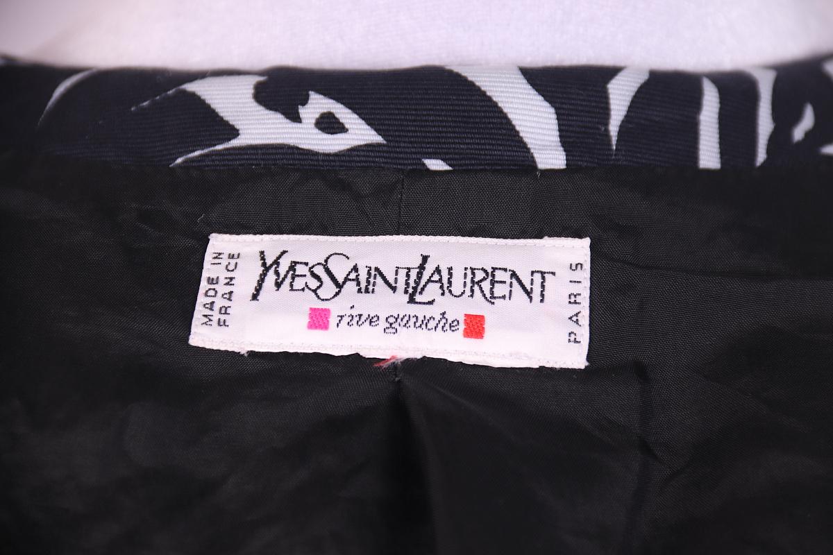1994 Yves Saint Laurent black and white crop jacket

Two-tone abstract printed cotton evening jacket
Boxy silhouette, padded shoulders
Open front, no closures
Lined
From the 1994 collection, Yves Saint Laurent Rive Gauche label, made in